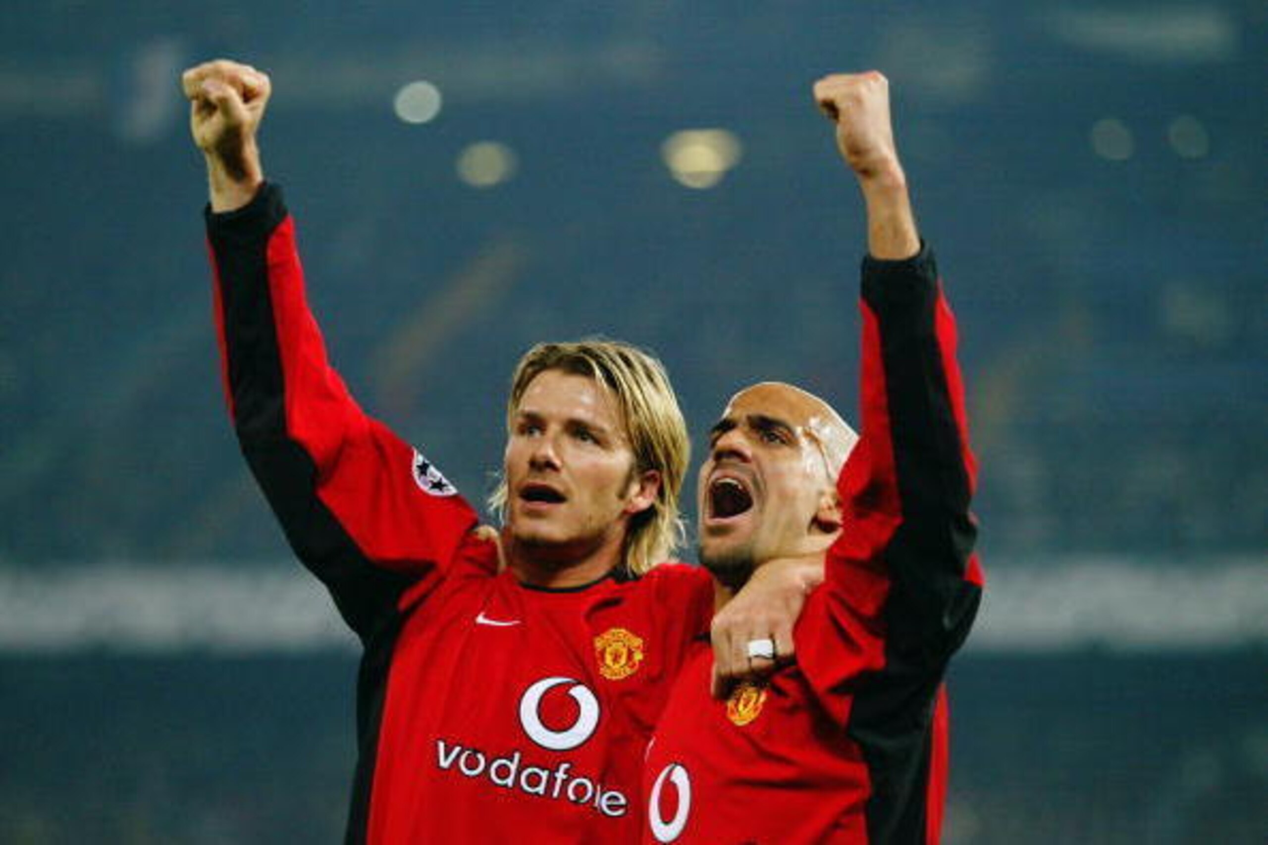 TURIN - FEBRUARY 25:  David Beckham and Juan Sebastian Veron of Manchester United celebrate the opening goal during the UEFA Champions League Second Phase Group D match between Juventus and Manchester United held on February 25, 2003 at the Stadio Delle A
