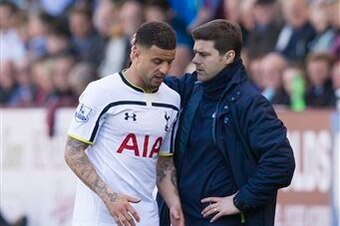 Mauricio Pochettino has a word with Walker after the defender suffered his latest injury at Turf Moor.