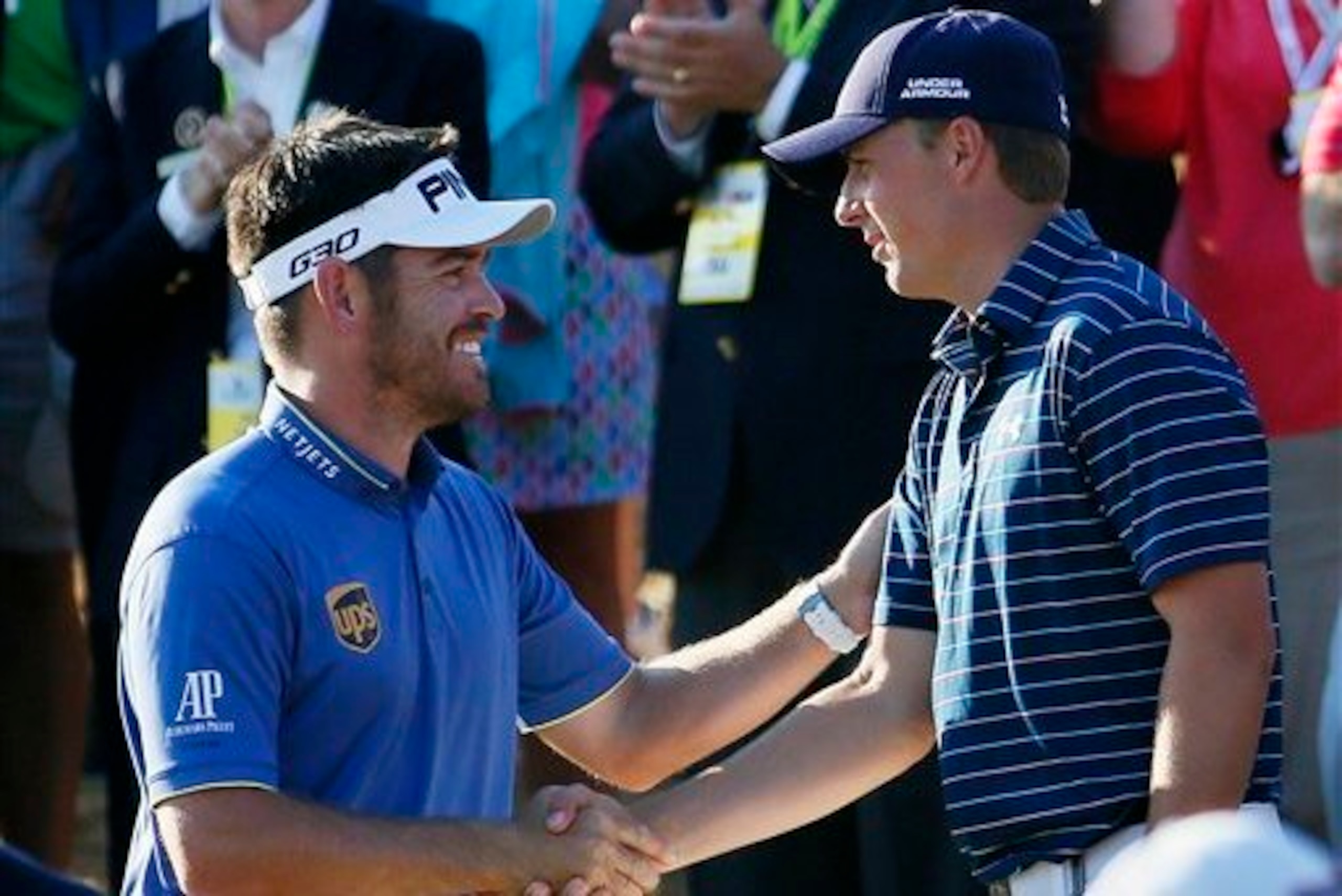Louis Oosthuizen congratulates Jordan Spieth.