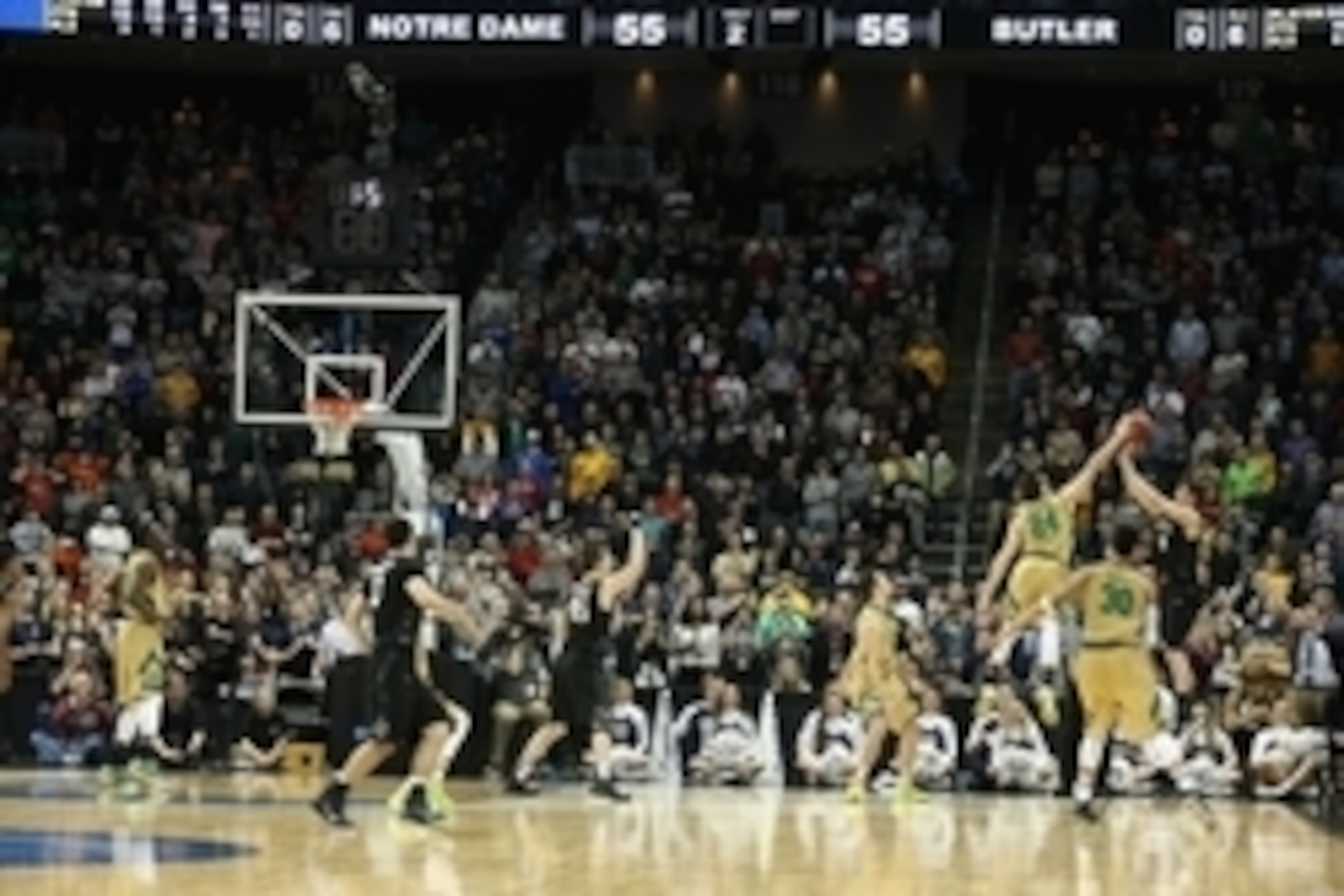 Mar 21, 2015; Pittsburgh, PA, USA; Notre Dame Fighting Irish guard Pat Connaughton (24) blocks the shot attempt of Butler Bulldogs guard Kellen Dunham (R) during the final second of regulation in the third round of the 2015 NCAA Tournament at the CONSOL E
