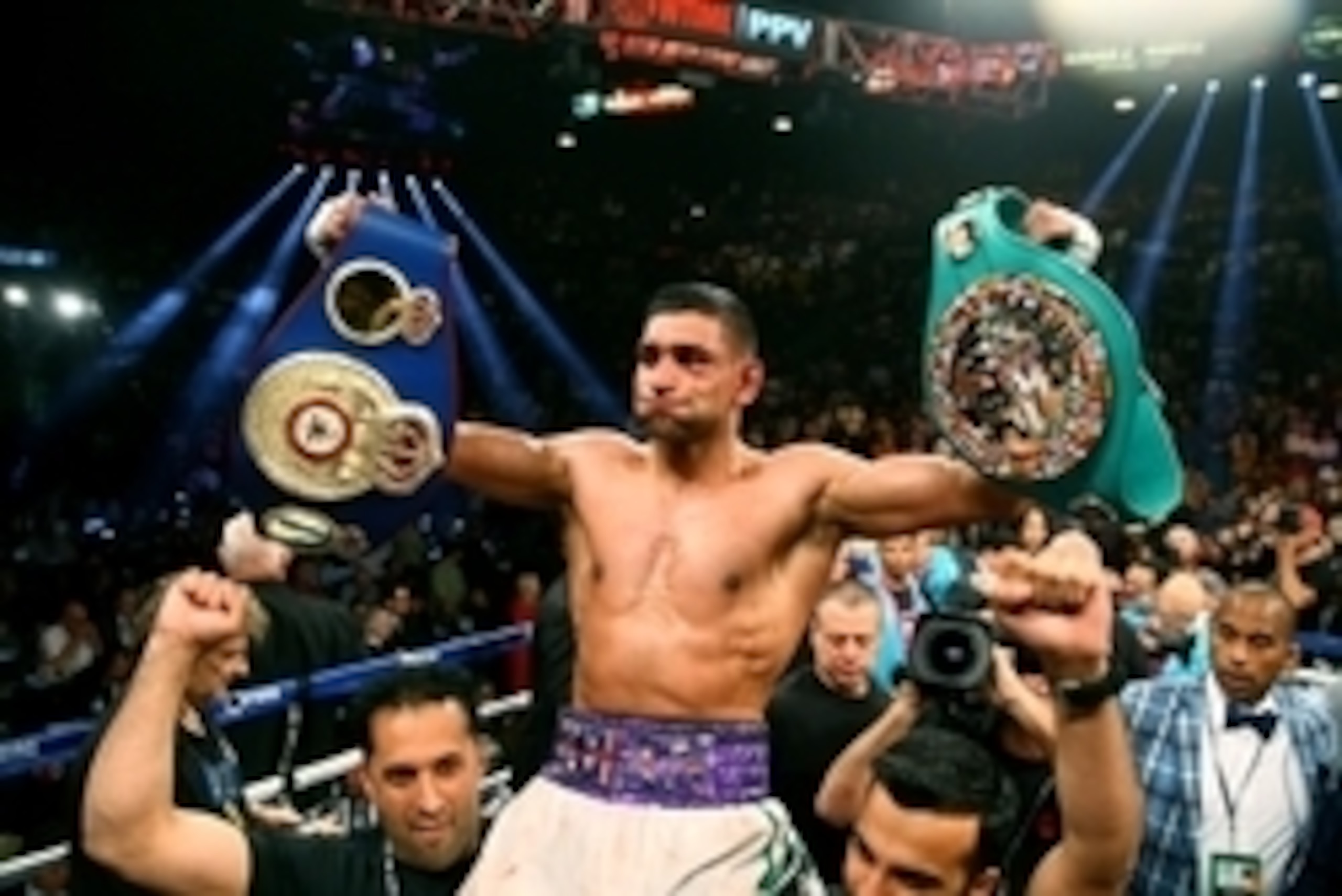 May 3, 2014; Las Vegas, NV, USA; Amir Khan celebrates after defeating Luis Collazo (not pictured) during their fight at MGM Grand. Mandatory Credit: Mark J. Rebilas-USA TODAY Sports