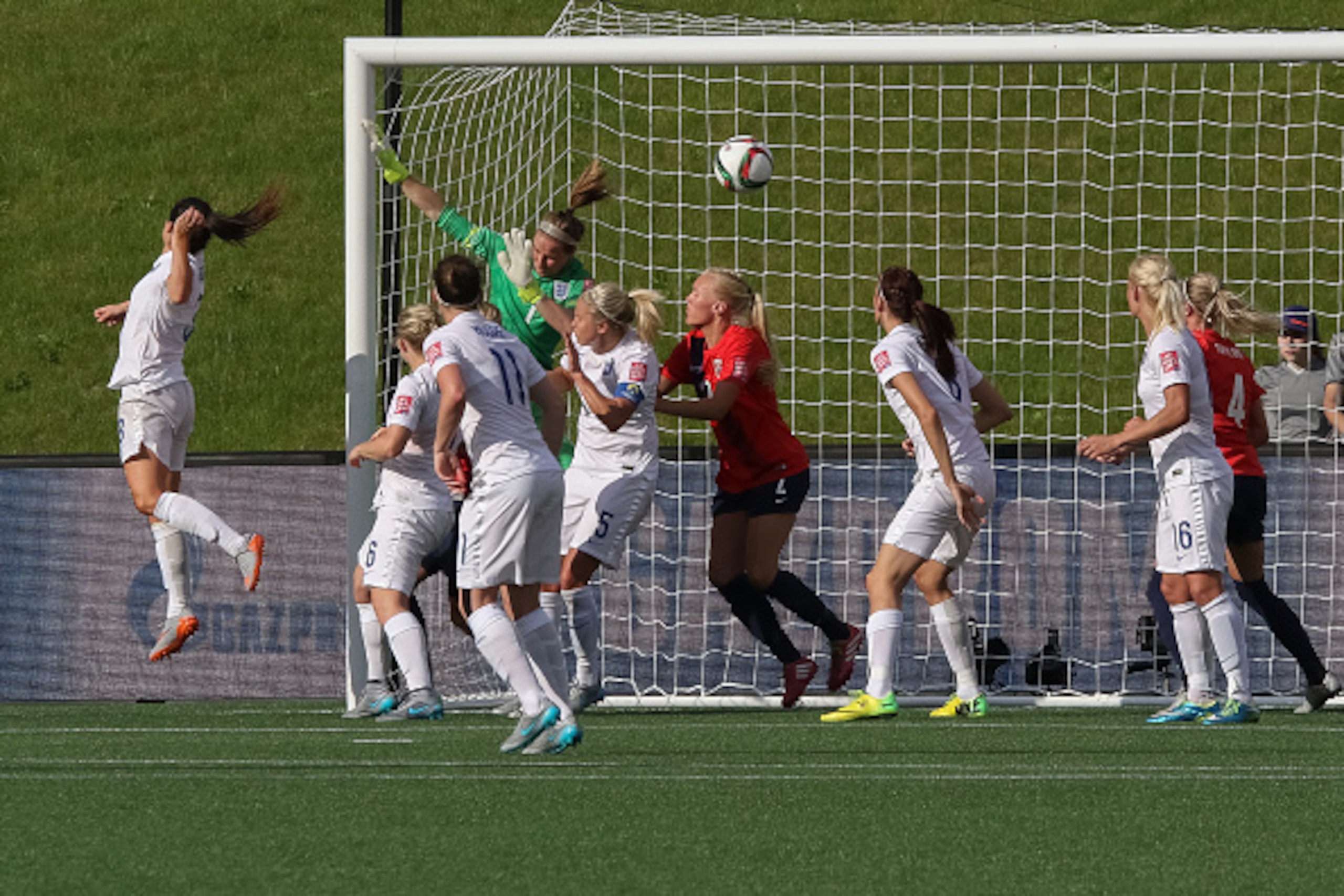 OTTAWA, ON - JUNE 22: Solveig Gulbrandsen of Norway scores the team's first goal of the game against goalkeeper Karen Bardsley #1 of England during the FIFA Women's World Cup Canada 2015 round of 16 match between Norway and England at Lansdowne Stadium on