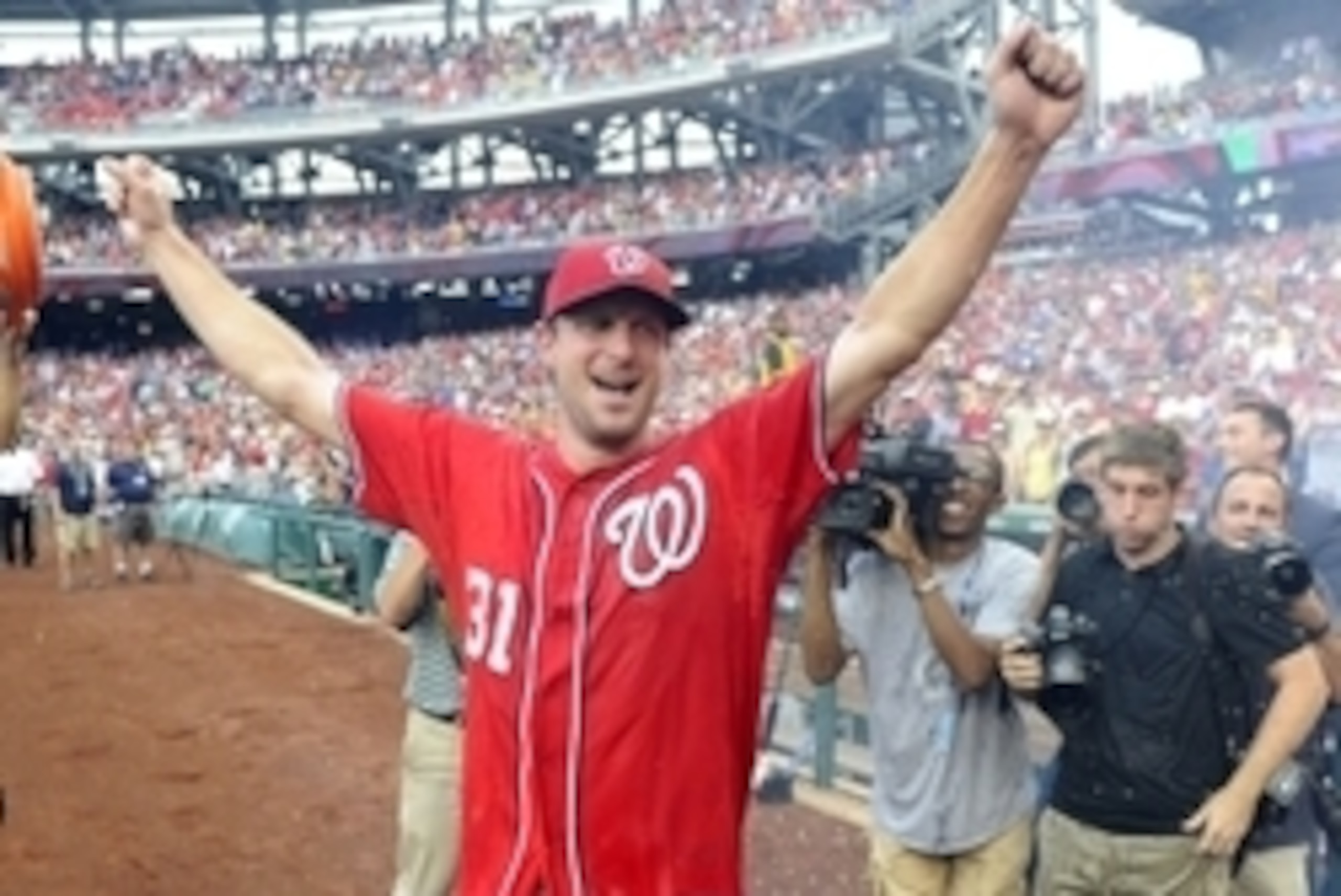 Jun 20, 2015; Washington, DC, USA; Washington Nationals starting pitcher Max Scherzer (31) celebrates after recording a no hitter against the Pittsburgh Pirates at Nationals Park. The Nationals won 6 - 0. Mandatory Credit: Brad Mills-USA TODAY Sports