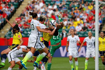 EDMONTON, AB - JUNE 22:  Abby Wambach #20 of the United States misses a header off a corner against Colombia in the first half in the FIFA Women's World Cup 2015 Round of 16 match at Commonwealth Stadium on June 22, 2015 in Edmonton, Canada.  (Photo by Ke