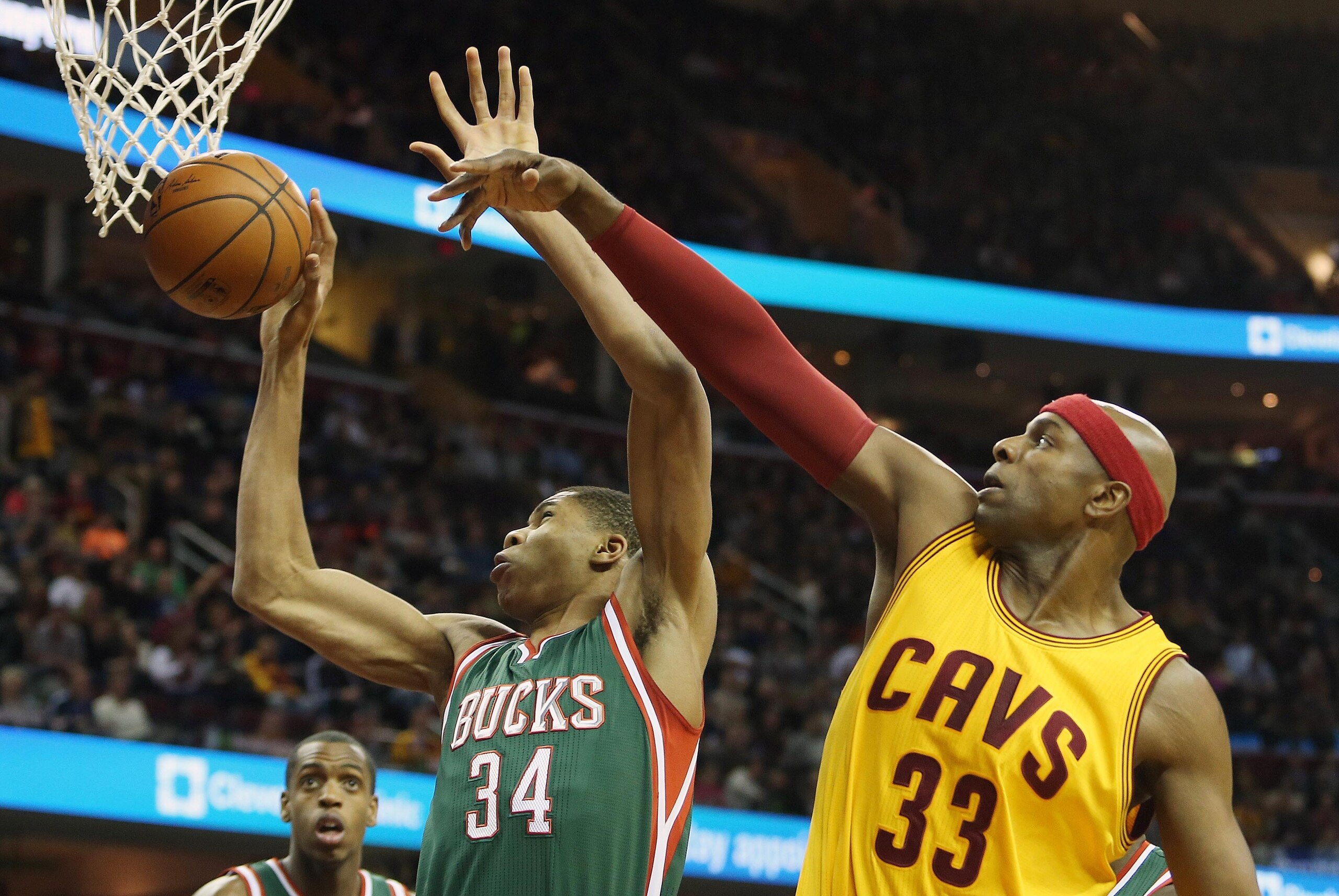 Dec 31, 2014; Cleveland, OH, USA; Cleveland Cavaliers center Brendan Haywood (33) battles Milwaukee Bucks guard Giannis Antetokounmpo (34) for a rebound during the first quarter at Quicken Loans Arena. Mandatory Credit: Ron Schwane-USA TODAY Sports
