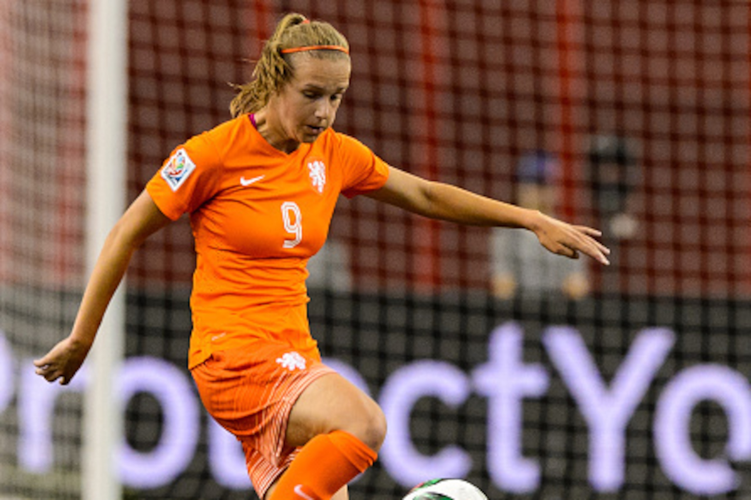 MONTREAL, QC - JUNE 15:  Vivianne Miedema #9 of the Netherlands kicks the ball during the 2015 FIFA Women's World Cup Group A match against Canada at Olympic Stadium on June 15, 2015 in Montreal, Quebec, Canada.  Final score between Canada and the Netherl