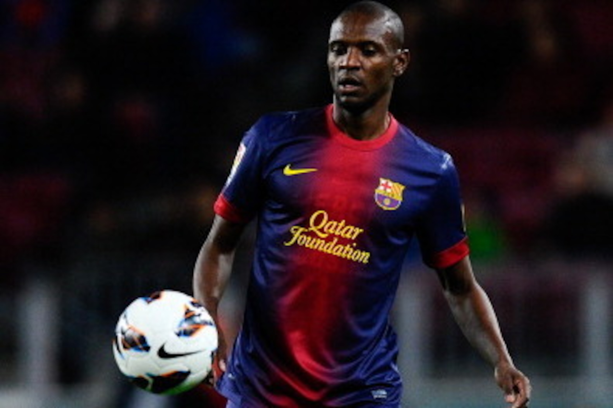 BARCELONA, SPAIN - APRIL 06:  Eric Abidal of FC Barcelona runs with the ball during the La Liga match between FC Barcelona and RCD Mallorca at Camp Nou on April 6, 2013 in Barcelona, Spain.  (Photo by David Ramos/Getty Images)