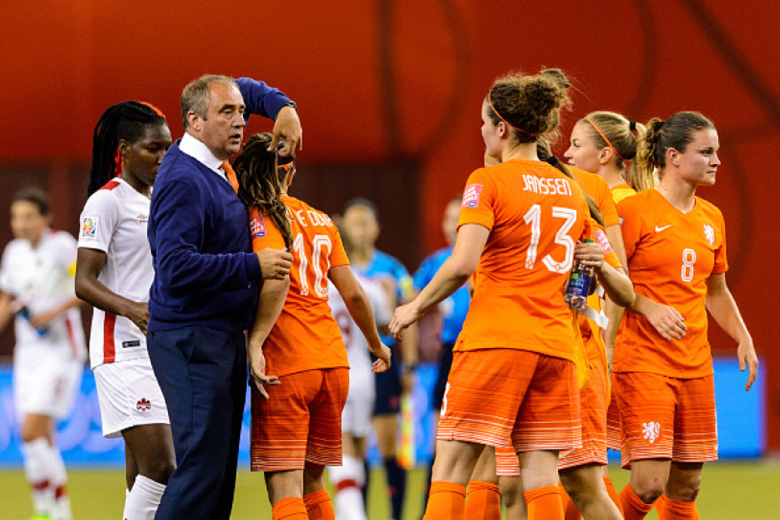 MONTREAL, QC - JUNE 15:  Roger Reijners head coach of the Netherlands congratulates his team during the 2015 FIFA Women's World Cup Group A match against Canada at Olympic Stadium on June 15, 2015 in Montreal, Quebec, Canada.  Final score between Canada a