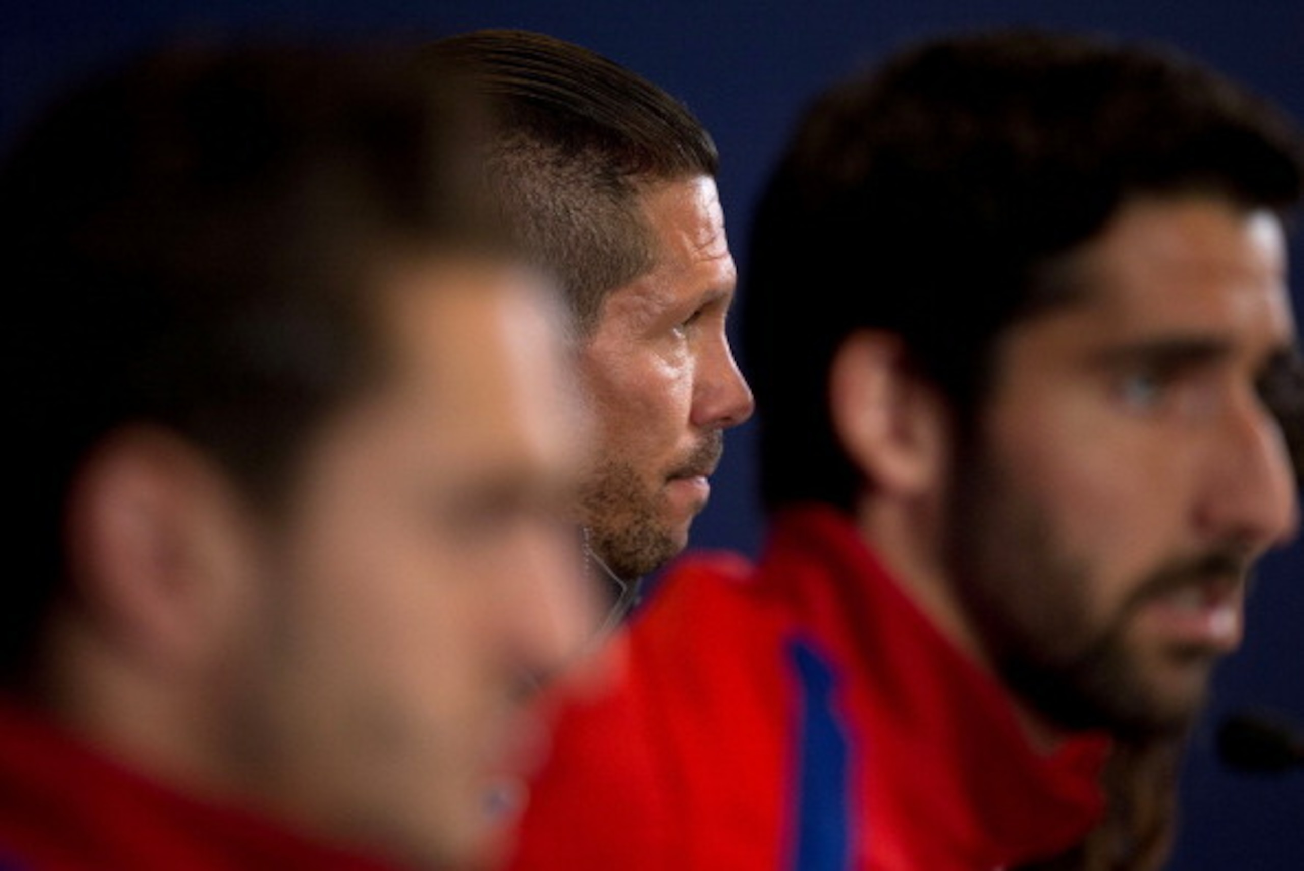 MADRID, SPAIN - APRIL 21: Head coach Diego Pablo Simeone of Club Atletico de Madrid (2ndL) answers questions from the media with his players Koke (L) and Raul Garcia (R) during a press conference the day before the UEFA Champions League Semifinal first l MADRID, SPAIN - APRIL 21: Head coach Diego Pablo Simeone of Club Atletico de Madrid (2ndL) answers questions from the media with his players Koke (L) and Raul Garcia (R) during a press conference the day before the UEFA Champions League Semifinal first l