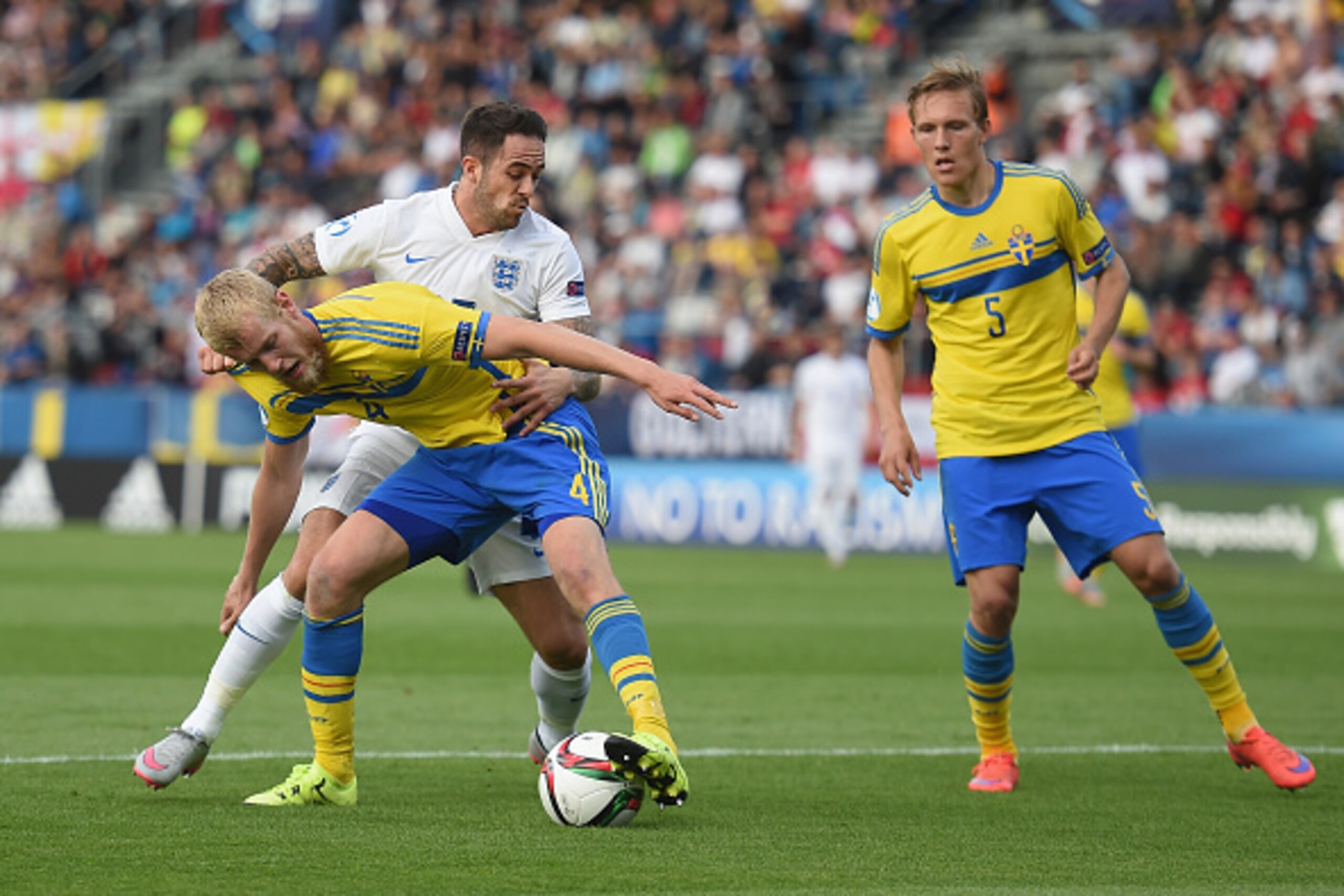 OLOMOUC, CZECH REPUBLIC - JUNE 21: Danny Ings of England battles Filip Helander of Sweden during the UEFA Under21 European Championship 2015 match between Sweden and England at Andruv Stadium on June 21, 2015 in Olomouc, Czech Republic.  (Photo by Michael