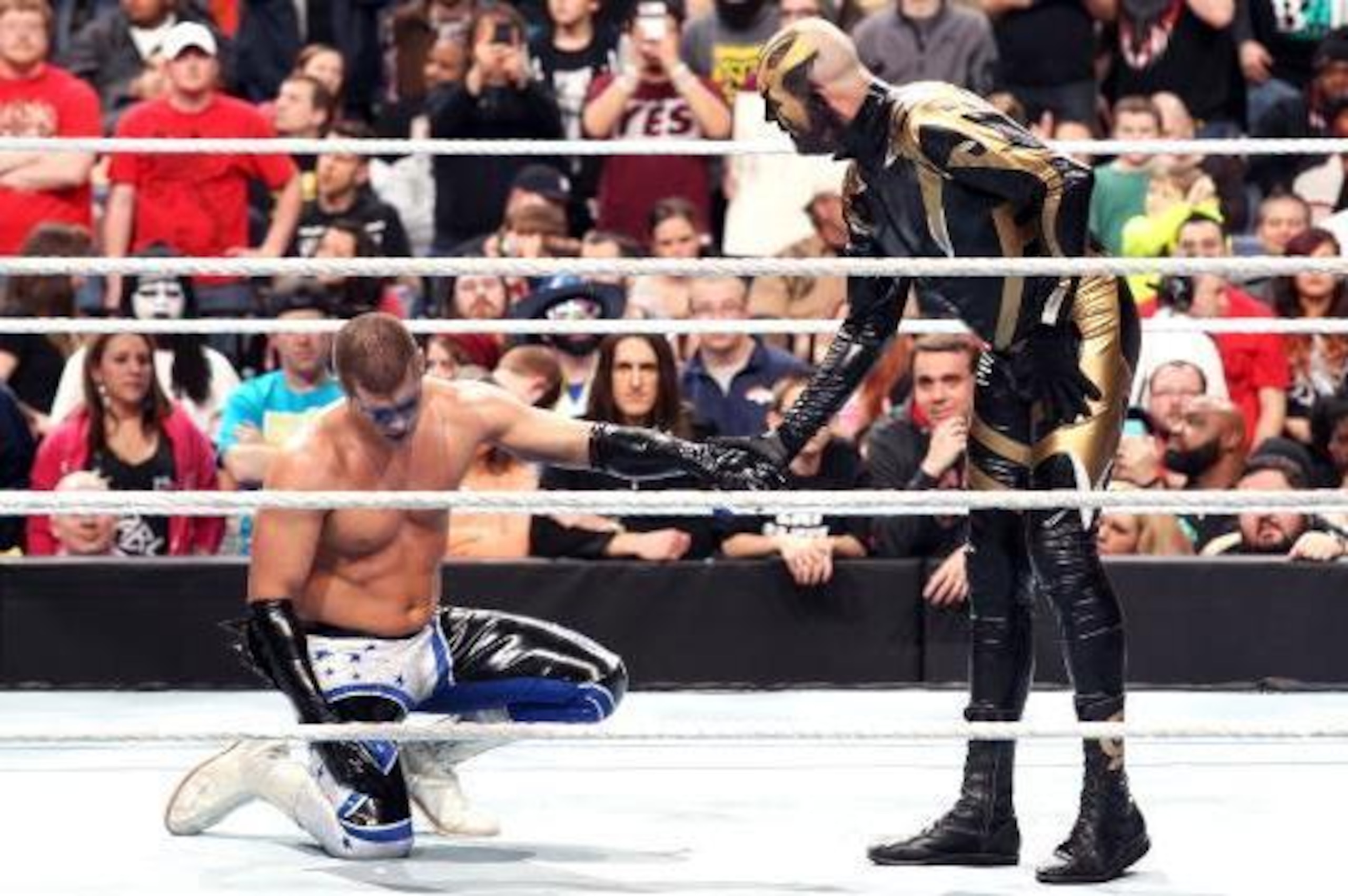 Goldust tries to give Stardust a hand.