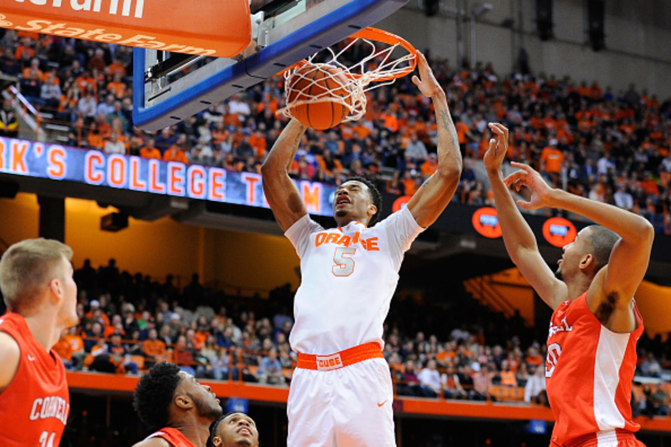SYRACUSE, NY - DECEMBER 31:  Chris McCullough #5 of the Syracuse Orange dunks the ball against the Cornell Big Red during the second half at the Carrier Dome on December 31, 2014 in Syracuse, New York.  Syracuse defeated Cornell 61-44.  (Photo by Rich Bar