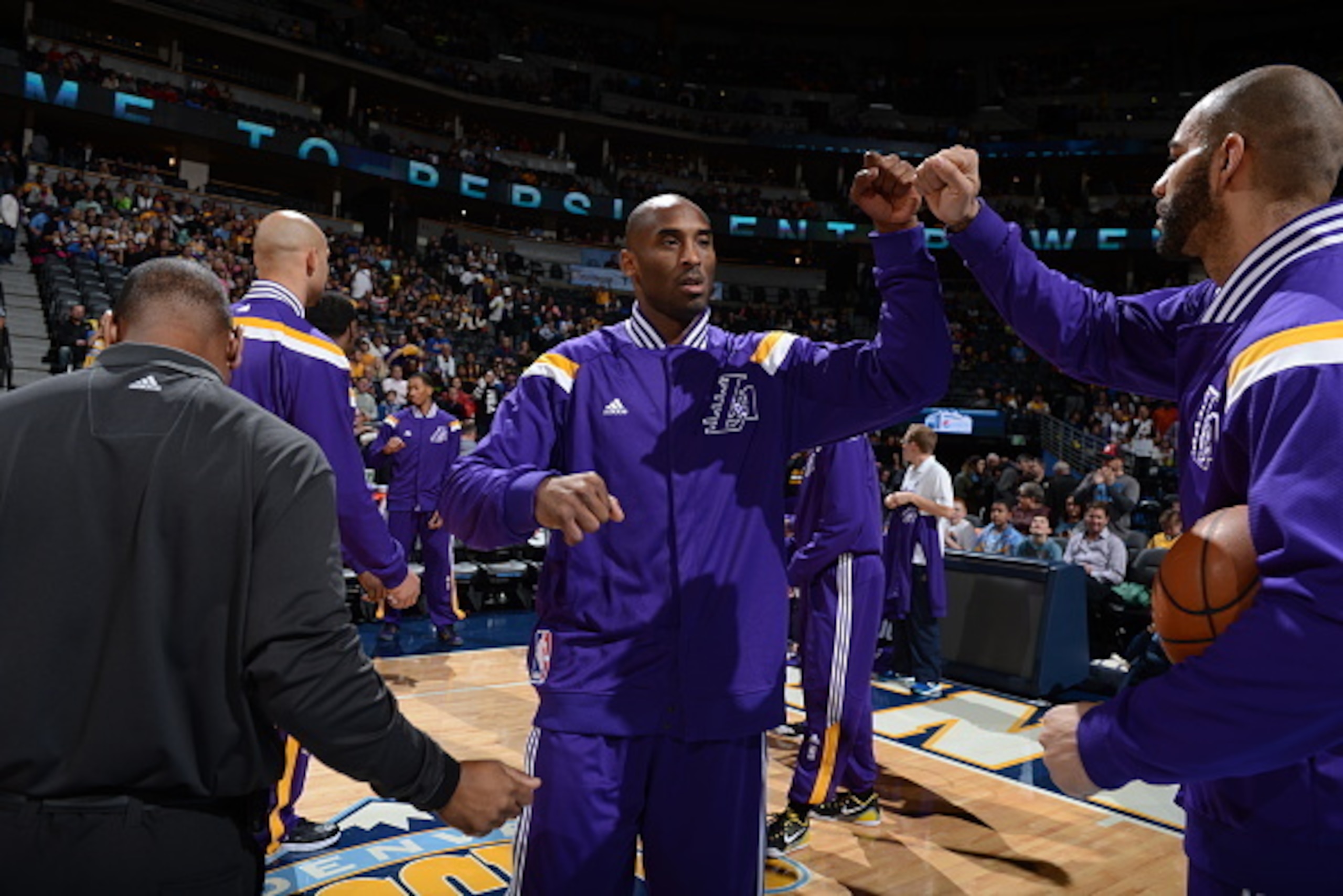 DENVER, CO - DECEMBER 30: Kobe Bryant #24 of the Los Angeles Lakers gets introduced before a game against the Denver Nuggets on December 30, 2014 at the Pepsi Center in Denver, Colorado. NOTE TO USER: User expressly acknowledges and agrees that, by downlo