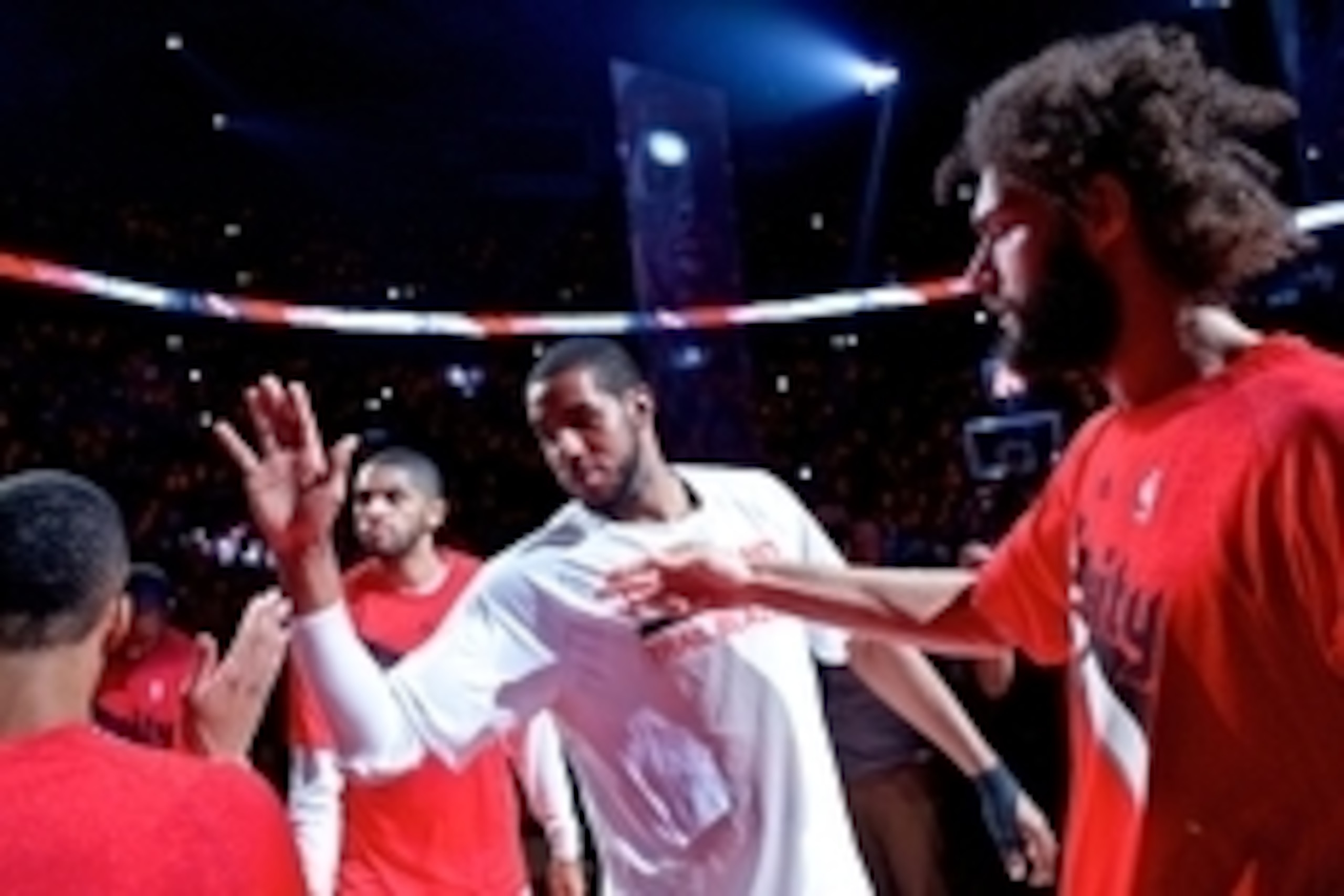 Apr 27, 2015; Portland, OR, USA; Portland Trail Blazers forward LaMarcus Aldridge (12) high fives teammates before game four against the Memphis Grizzlies in the first round of the NBA Playoffs at the Moda Center. Mandatory Credit: Craig Mitchelldyer-USA 