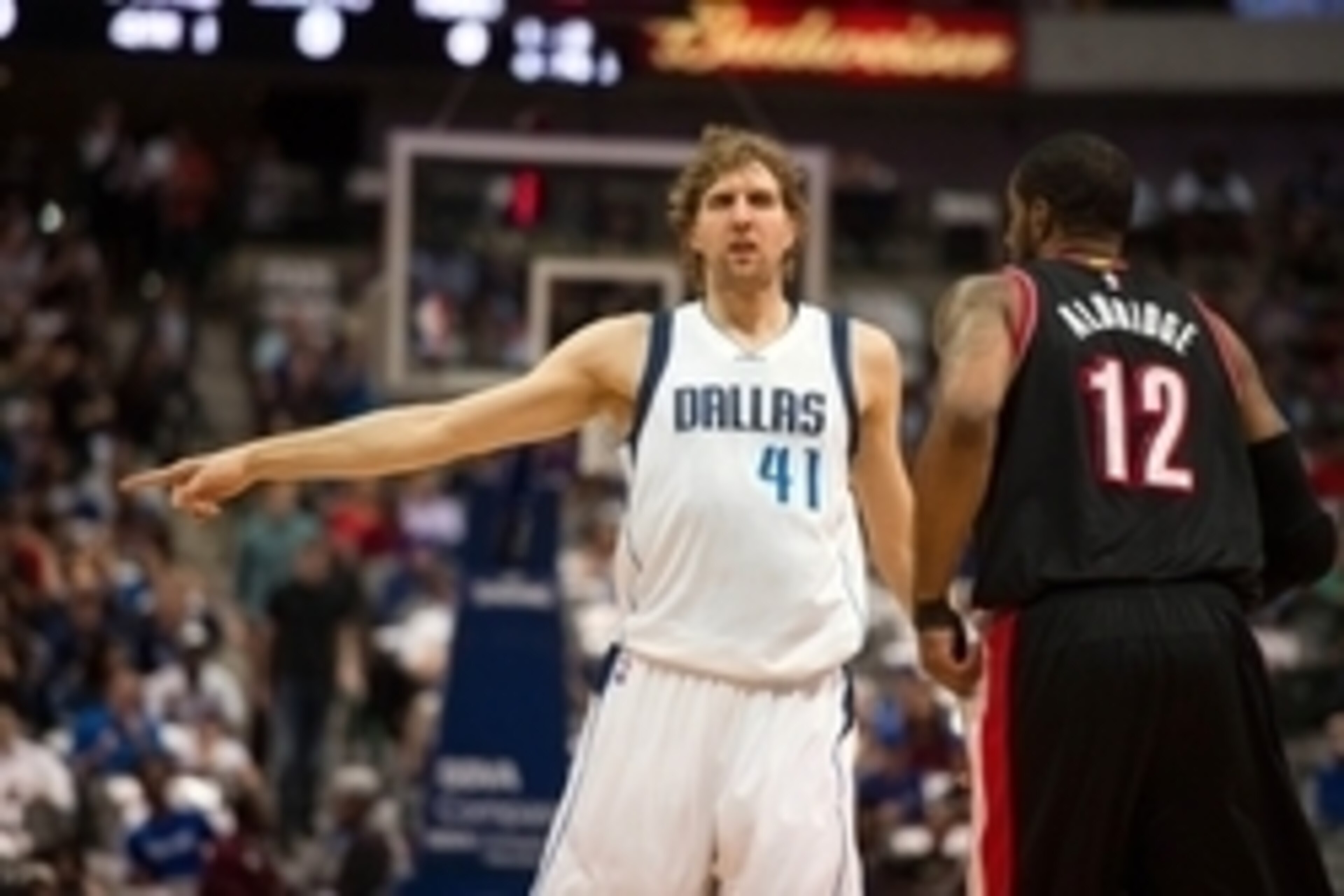 Apr 15, 2015; Dallas, TX, USA; Dallas Mavericks forward Dirk Nowitzki (41) defends against Portland Trail Blazers forward LaMarcus Aldridge (12) during the first quarter at the American Airlines Center. Mandatory Credit: Jerome Miron-USA TODAY Sports
