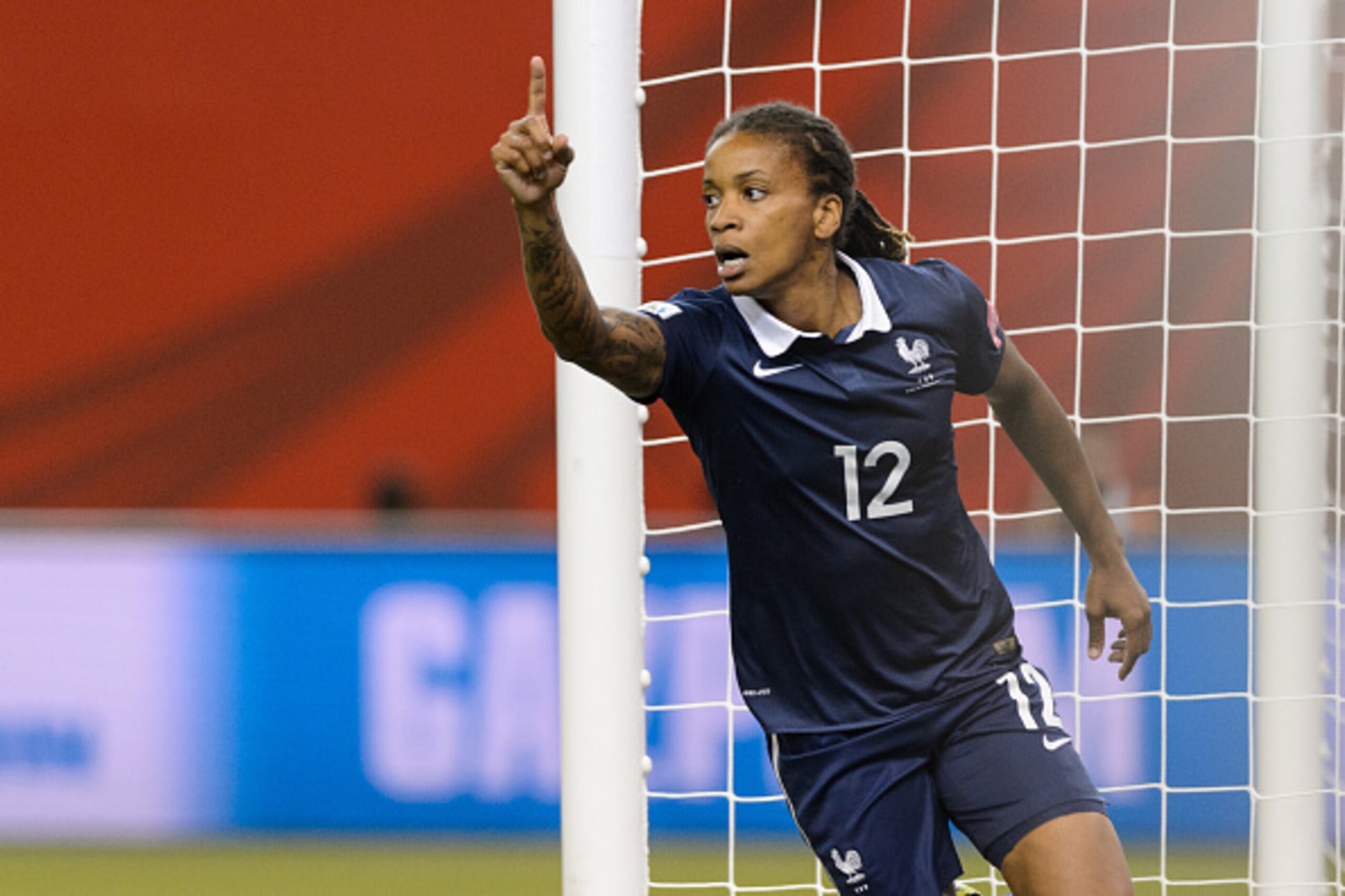 MONTREAL, QC - JUNE 21: Elodie Thomis #12 of France celebrates her goal during the 2015 FIFA Women's World Cup Round of 16 match against Korea Republic at Olympic Stadium on June 21, 2015 in Montreal, Quebec, Canada. (Photo by Minas Panagiotakis/Getty I MONTREAL, QC - JUNE 21: Elodie Thomis #12 of France celebrates her goal during the 2015 FIFA Women's World Cup Round of 16 match against Korea Republic at Olympic Stadium on June 21, 2015 in Montreal, Quebec, Canada. (Photo by Minas Panagiotakis/Getty I