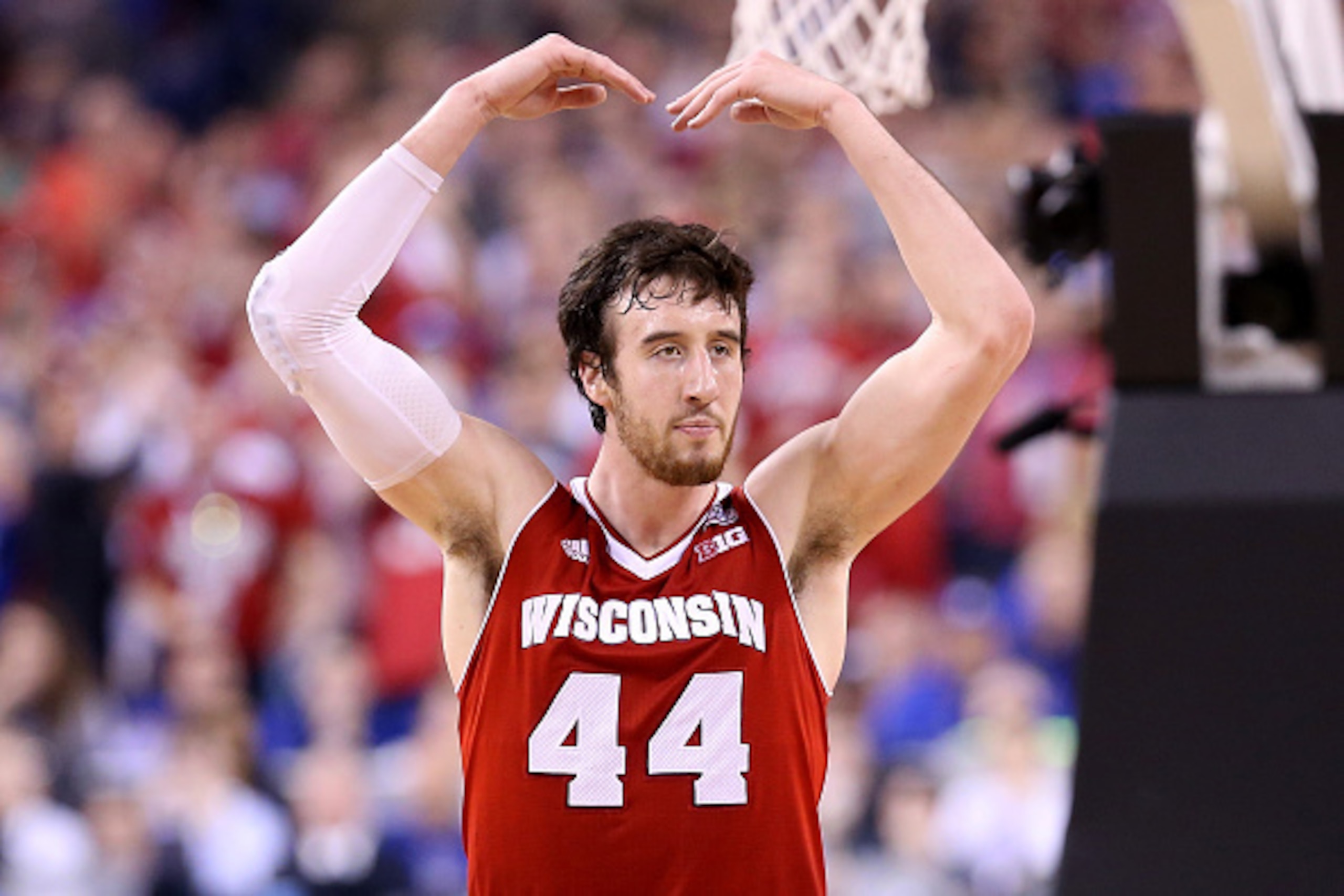 INDIANAPOLIS, IN - APRIL 06: Frank Kaminsky #44 of the Wisconsin Badgers reacts after a play in the second half against the Duke Blue Devils during the NCAA Men's Final Four National Championship at Lucas Oil Stadium on April 6, 2015 in Indianapolis, Indi