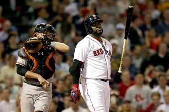 BOSTON, MA - JUNE 23:  David Ortiz #34 of the Boston Red Sox reacts after he struck in the seventh inning during a game with Baltimore Orioles at Fenway Park on June 23, 2015 in Boston, Massachusetts.  (Photo by Jim Rogash/Getty Images)