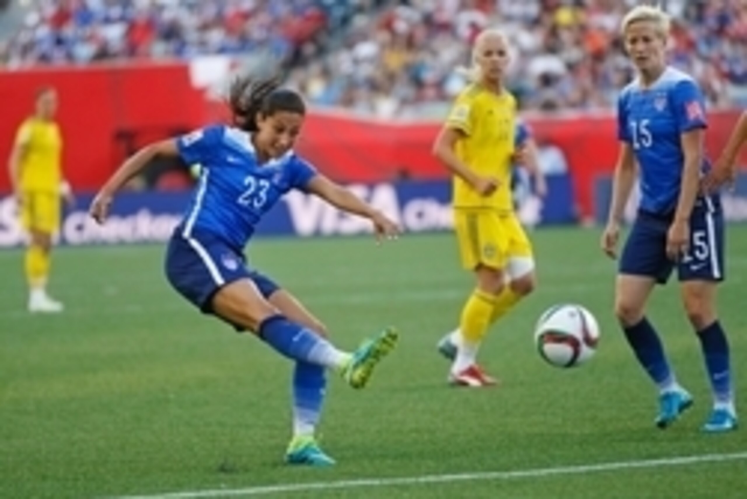 Jun 12, 2015; Winnipeg, Manitoba, CAN; United States forward Christen Press (23) takes a shot against Sweden in a Group D soccer match in the 2015 FIFA women's World Cup at Winnipeg Stadium. At right is midfielder Megan Rapinoe (15). The game ended in a 0