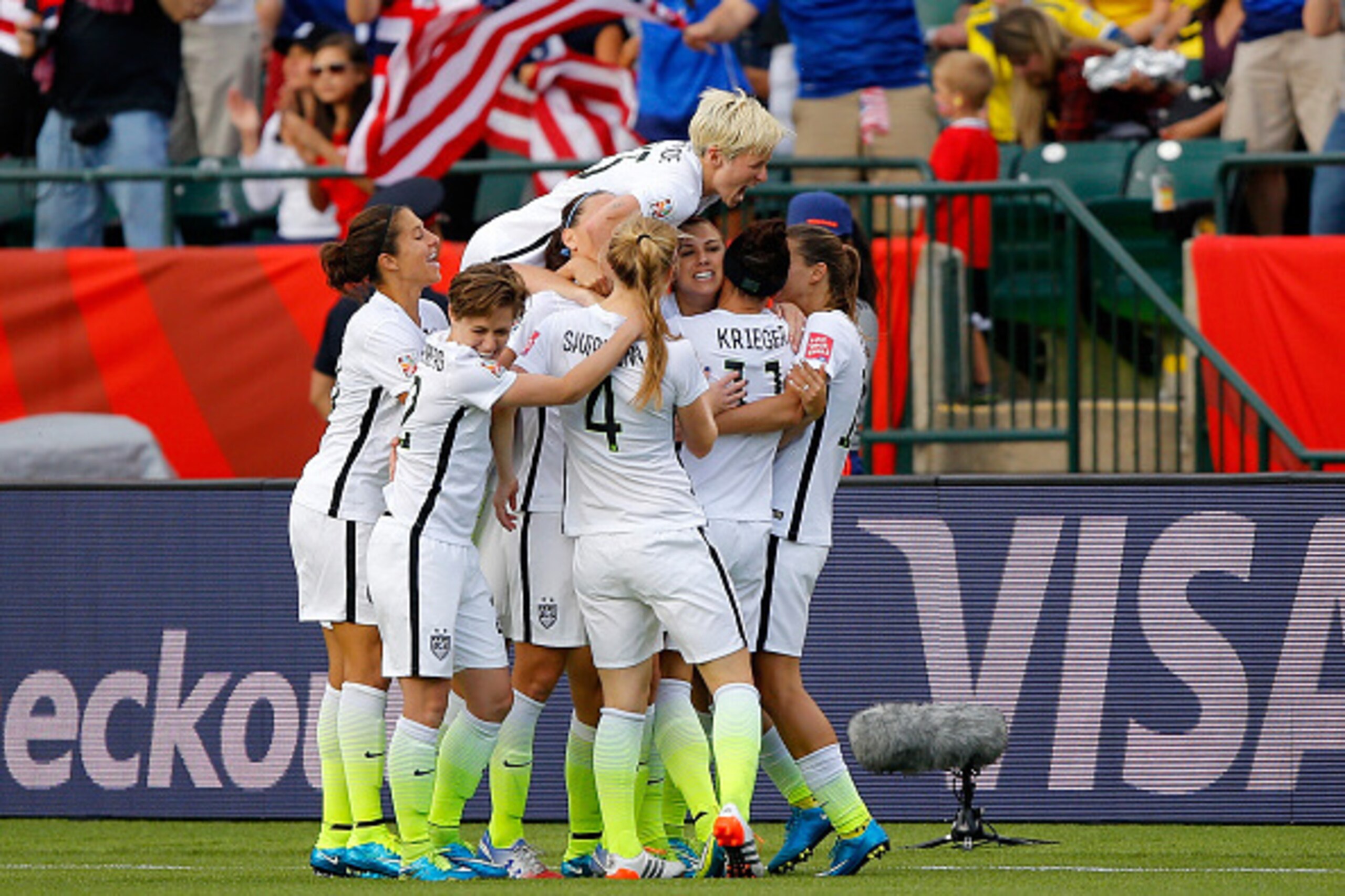 EDMONTON, AB - JUNE 22:  Alex Morgan #13 of the United States celebrates with teammates after Morgan scores her first goal against goalkeeper Stefany Castano #1 of Colombia in the second half in the FIFA Women's World Cup 2015 Round of 16 match at Commonw