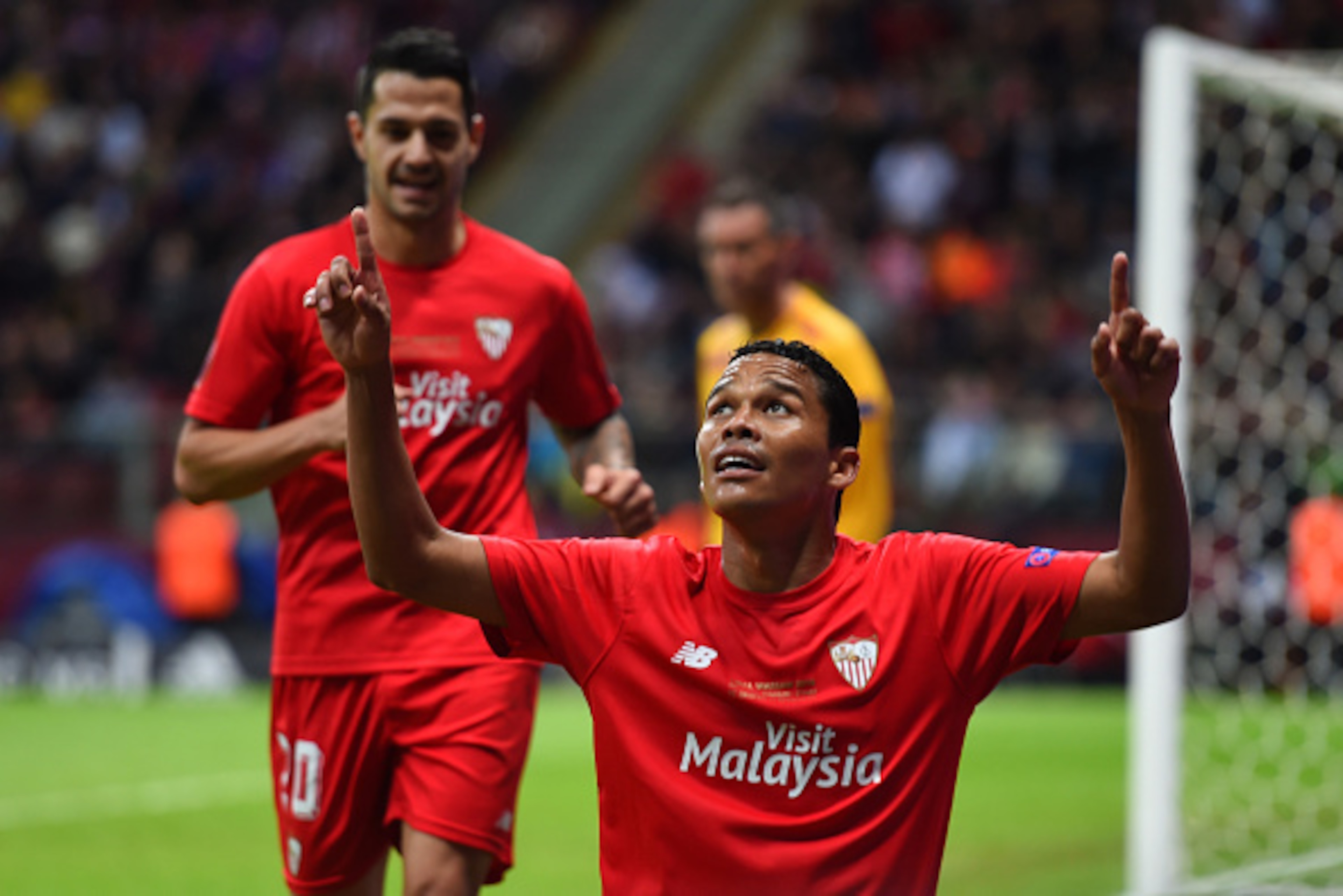 WARSAW, POLAND - MAY 27:  Carlos Bacca of Sevilla celebrates scoring his team's second goal during the UEFA Europa League Final match between FC Dnipro Dnipropetrovsk and FC Sevilla on May 27, 2015 in Warsaw, Poland.  (Photo by Shaun Botterill/Getty Image
