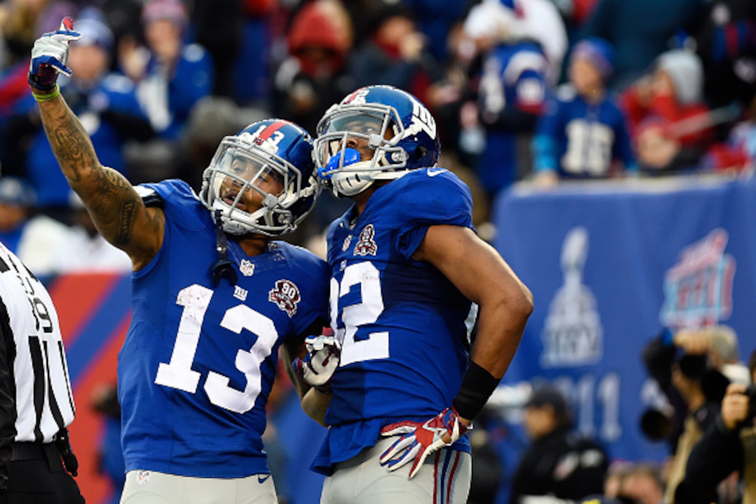 EAST RUTHERFORD, NJ - DECEMBER 28:  Odell Beckham #13 and  Rueben Randle #82 of the New York Giants celebrate against the Philadelphia Eagles during a game at MetLife Stadium on December 28, 2014 in East Rutherford, New Jersey.  (Photo by Alex Goodlett/Ge
