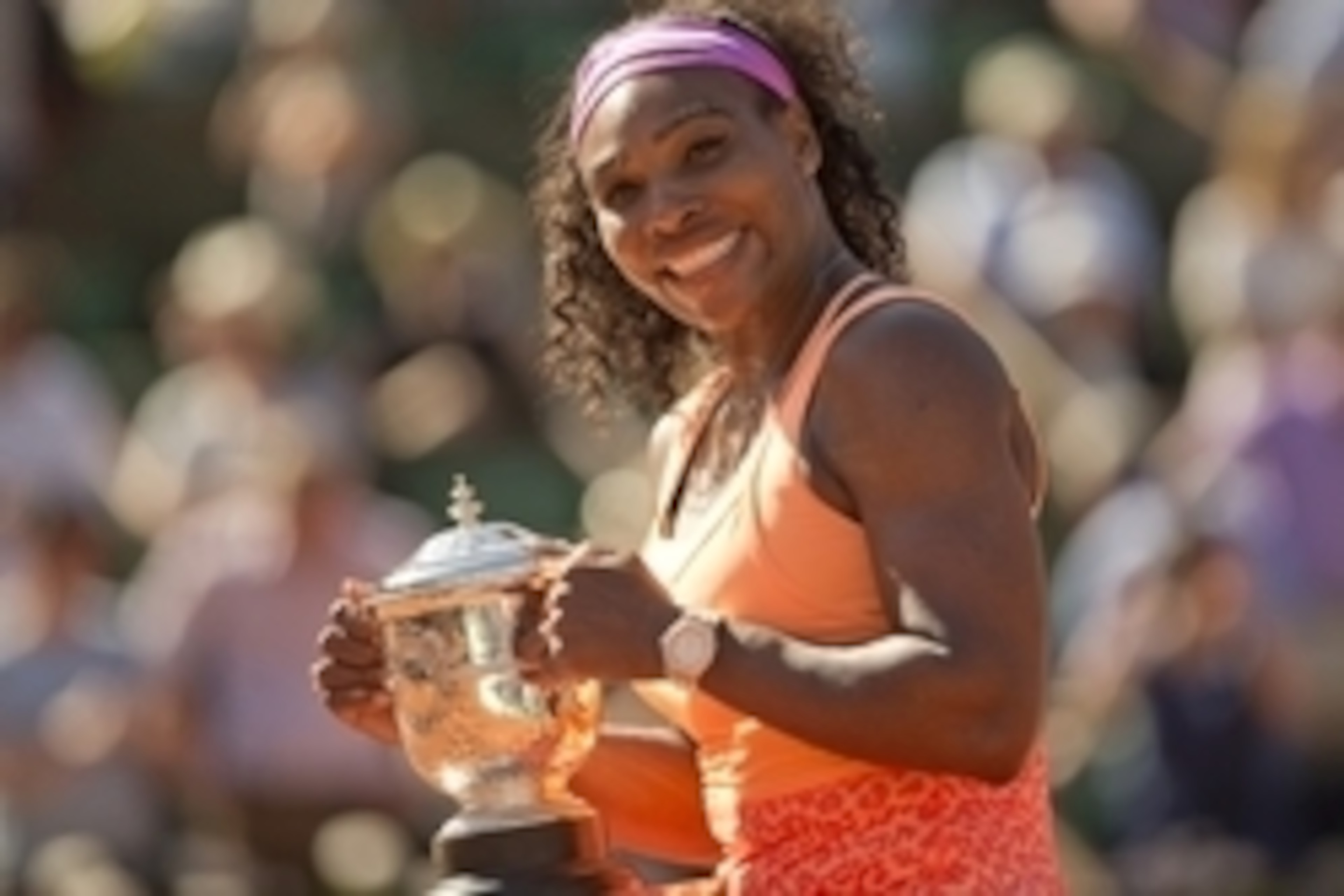 Jun 6, 2015; Paris, France; Serena Williams (USA) poses with the trophy after her match against Lucie Safarova (CZE) on day 14 of the 2015 French Open at Roland Garros. Mandatory Credit: Susan Mullane-USA TODAY Sports
