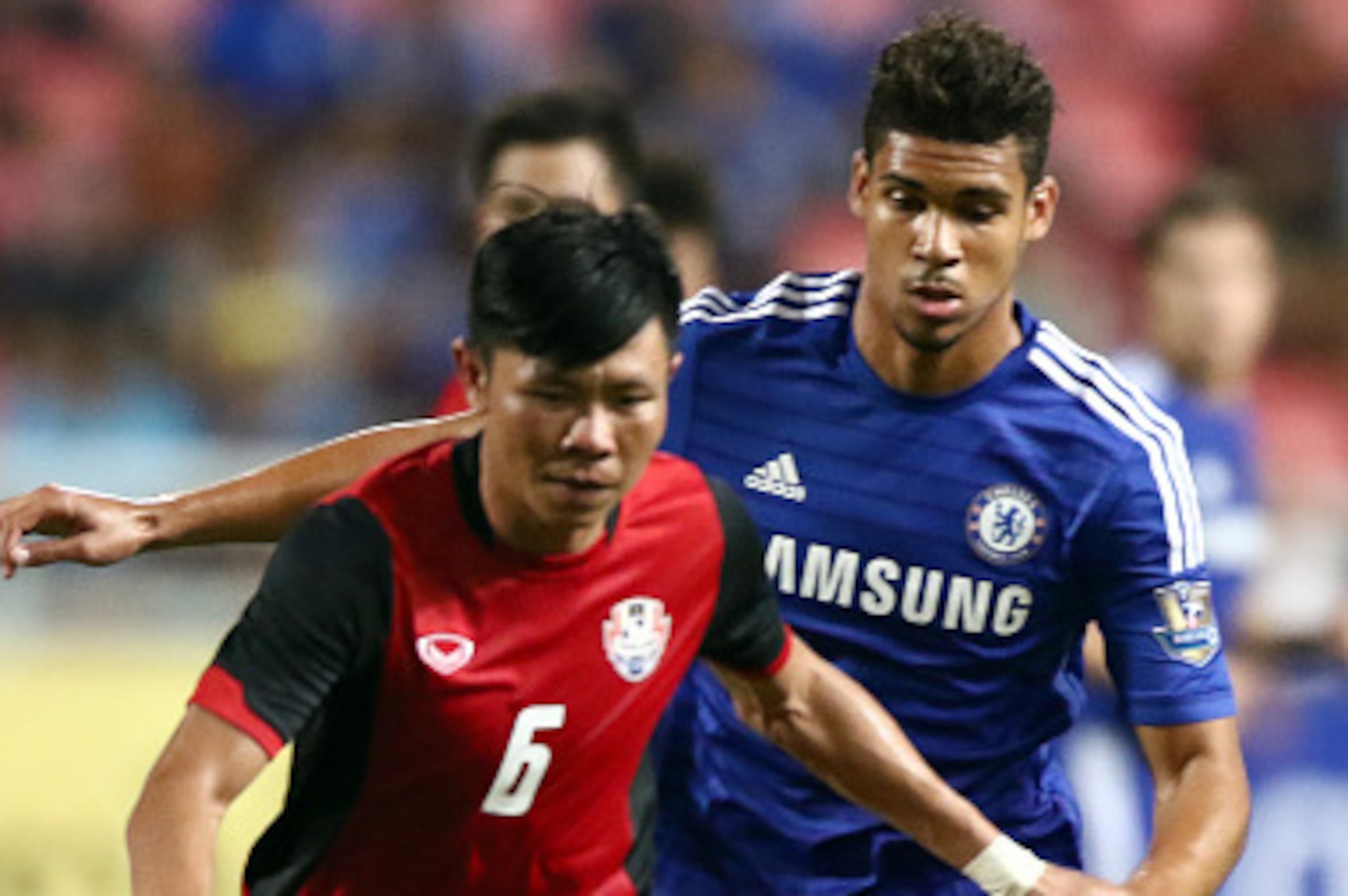 BANGKOK, THAILAND - MAY 30: Ruben Loftus-Cheek of Chelsea competes with Yutahjak Konjan of Thailand All-Stars during the international friendly match between Thailand All-Stars and Chelsea FC at Rajamangala Stadium on May 30, 2015 in Bangkok, Thailand.  (