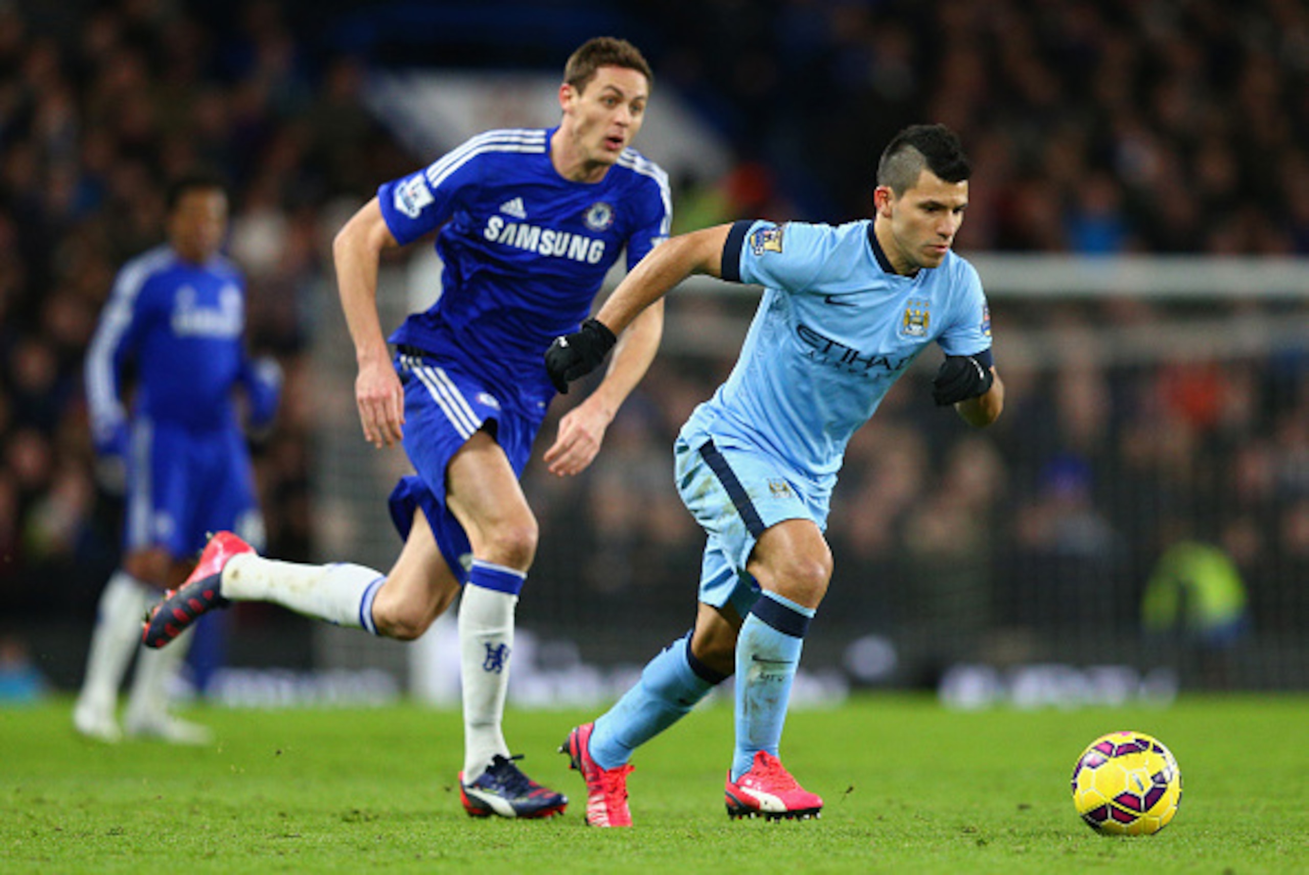 LONDON, ENGLAND - JANUARY 31: Sergio Aguero of Manchester City breaks away from Nemanja Matic of Chelsea  during the Barclays Premier League match between Chelsea and Manchester City at Stamford Bridge on January 31, 2015 in London, England.  (Photo by Cl