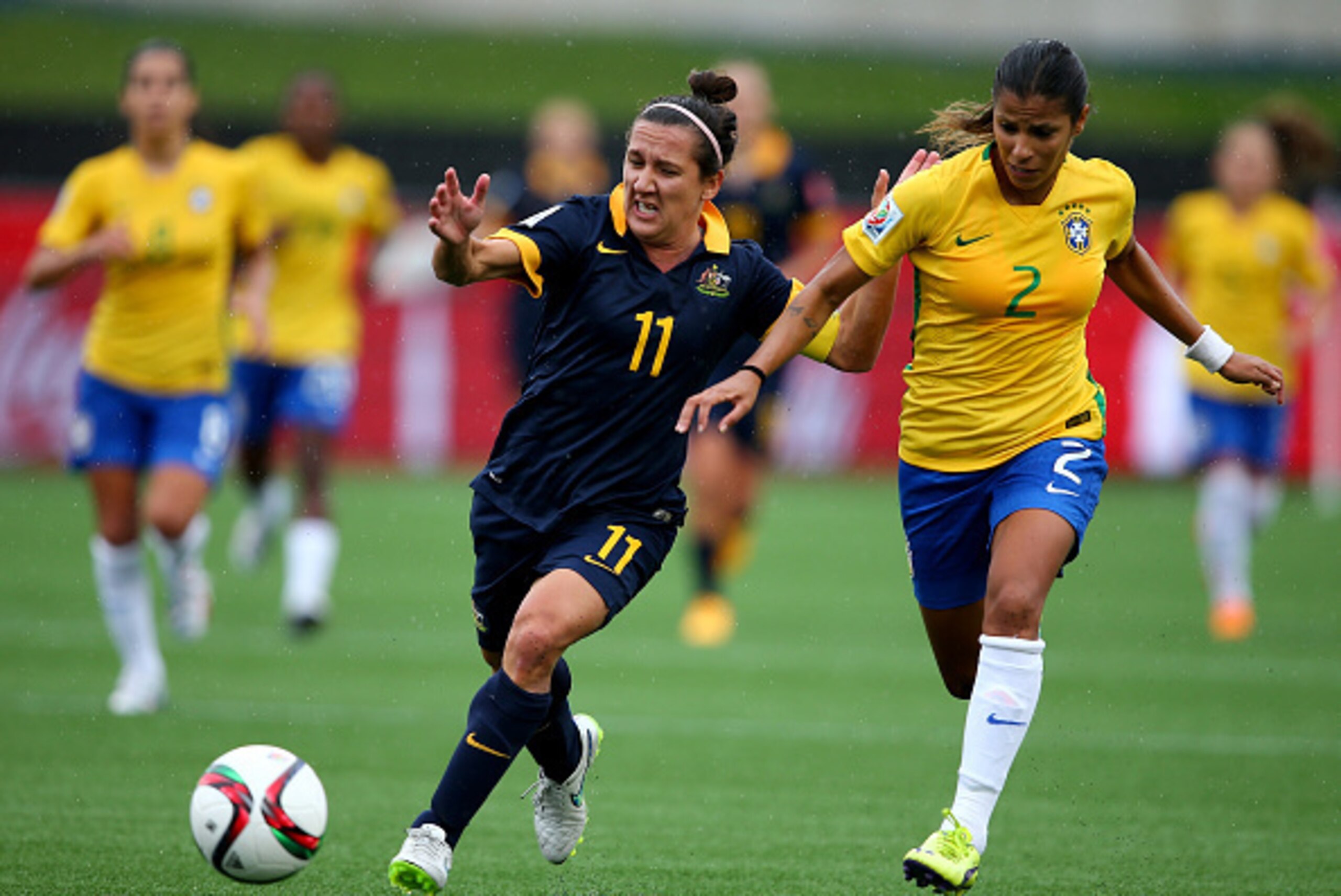 MONCTON, NB - JUNE 21:  Lisa De Vanna #11 of Australia takes the ball as Fabiana #2 of Brazil defends during the FIFA Women's World Cup 2015 round of 16 match between Brazil and Australia at Moncton Stadium on June 21, 2015 in Moncton, Canada.  (Photo by 