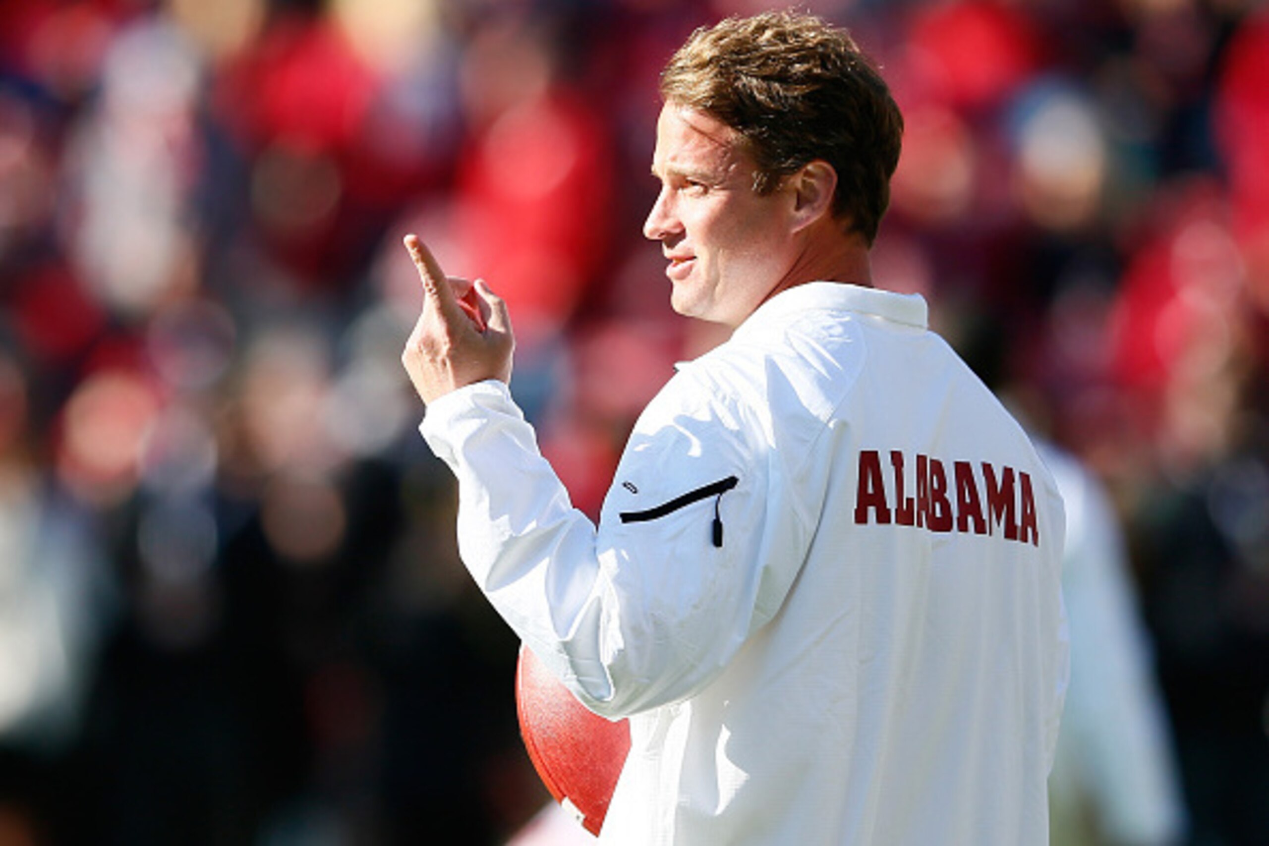 TUSCALOOSA, AL - NOVEMBER 15:  Offensive Coordinator Lane Kiffin of the Alabama Crimson Tide works out during pregame warmups prior to facing the Mississippi State Bulldogs at Bryant-Denny Stadium on November 15, 2014 in Tuscaloosa, Alabama.  (Photo by Ke