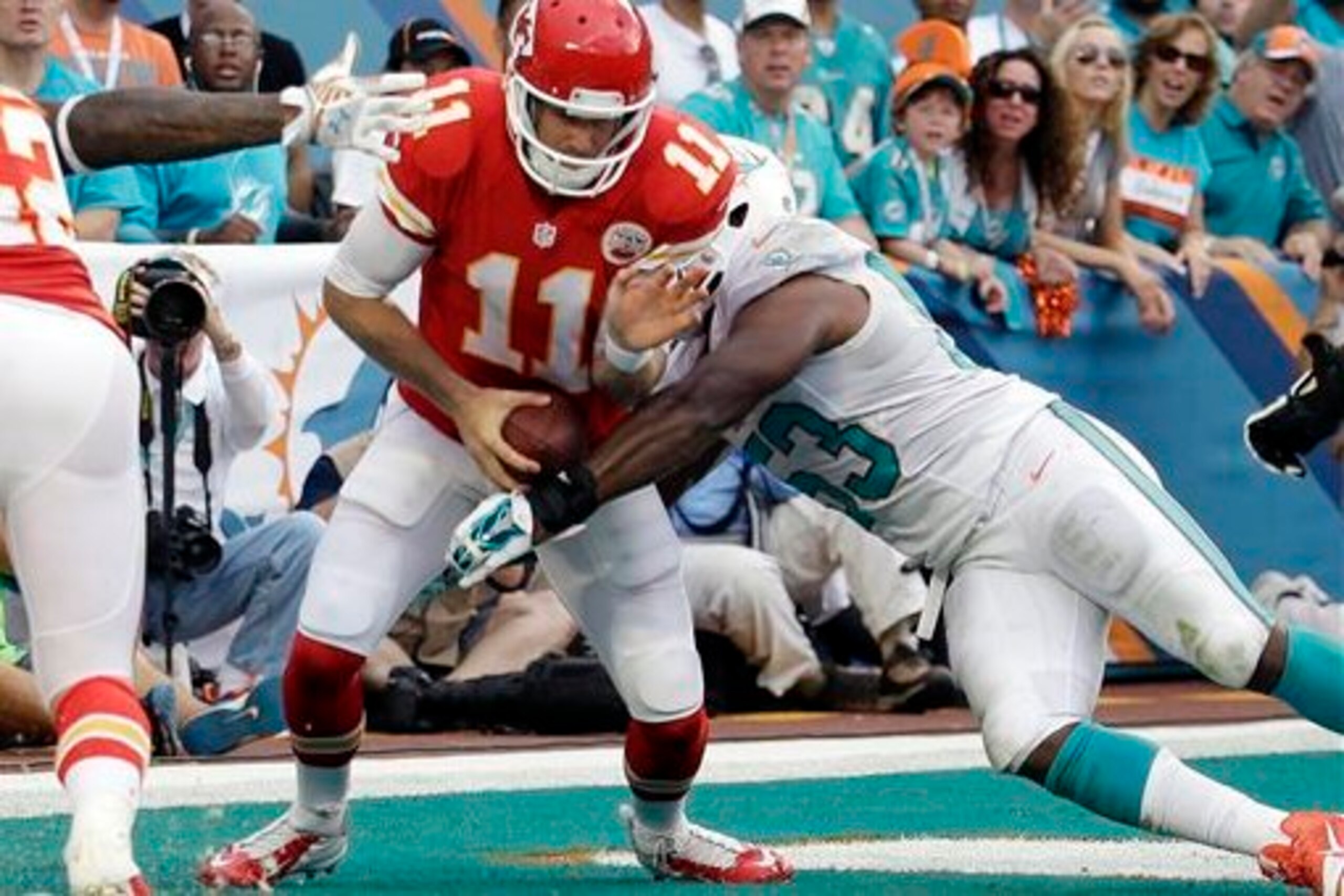 Jelani Jenkins (53, right) was a big hit at the weakside linebacker spot in 2014.
