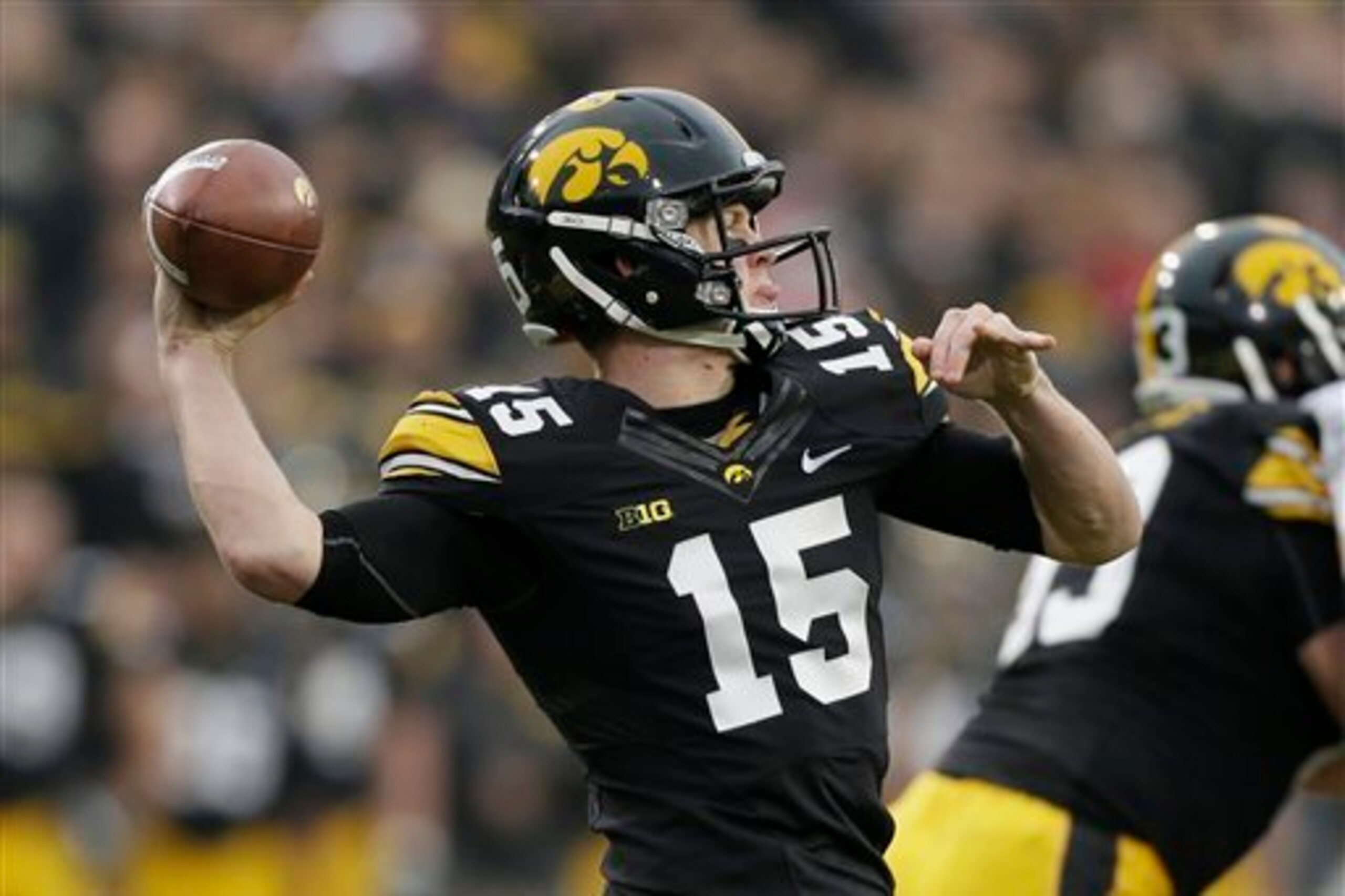 Michigan transfer Jake Rudock attempts a pass during his time at Iowa.