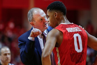 BLOOMINGTON, IN - JANUARY 10: Head coach Thad Matta of the Ohio State Buckeyes talks to D'Angelo Russell #0 of the Ohio State Buckeyes during the game against the Indiana Hoosiers at Assembly Hall on January 10, 2015 in Bloomington, Indiana. Indiana defea