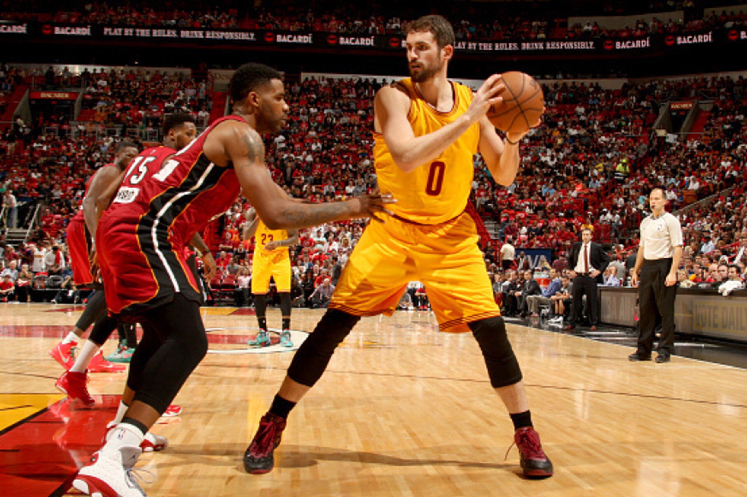 MIAMI, FL - DECEMBER 25: Kevin Love #0 of the Cleveland Cavaliers handles the basketball during a game against the Miami Heat at the American Airlines Arena on December 25, 2014 in Miami, Florida. NOTE TO USER: User expressly acknowledges and agrees that,