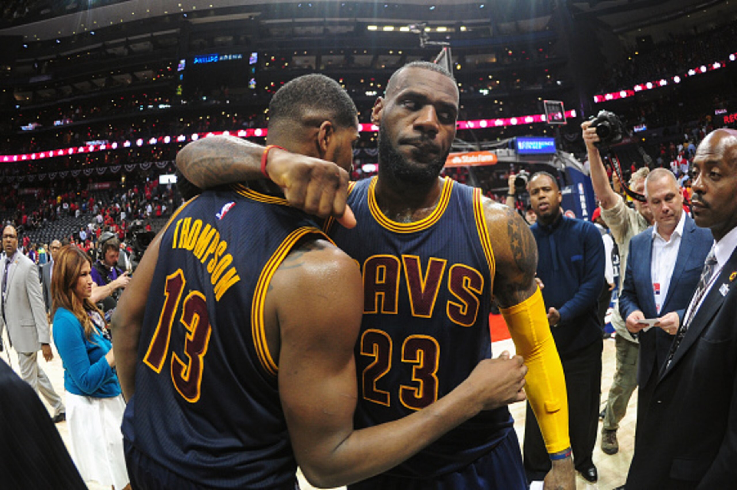 ATLANTA, GA - MAY 20: Tristan Thompson #13 and LeBron James #23 of the Cleveland Cavaliers celebrates after a game against the Atlanta Hawks during Game One of the Eastern Conference Finals during the NBA Playoffs on May 20, 2015 at Philips Arena in Atlan