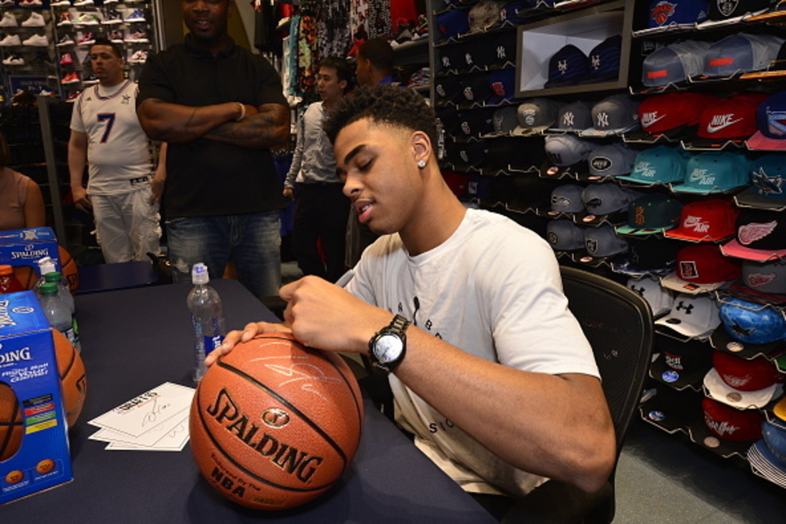 NEW YORK, NY - JUNE 22:  NBA Draft Prospect D'Angelo Russell signs autographs at the Champs sporting goods store on June 22, 2015 in New York City, New York. NOTE TO USER: User expressly acknowledges and agrees that, by downloading and/or using this Photo
