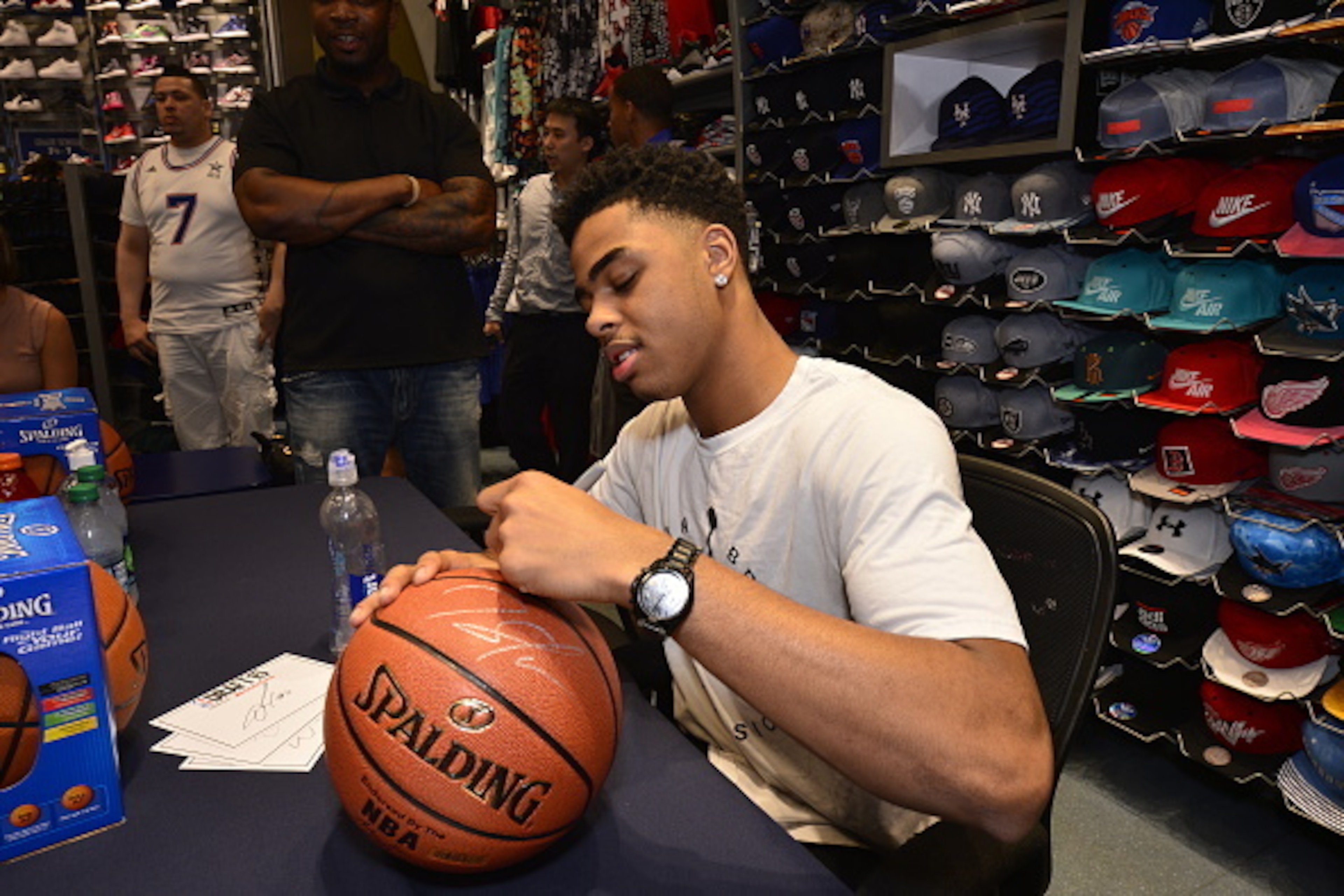 NEW YORK, NY - JUNE 22:  NBA Draft Prospect D'Angelo Russell signs autographs at the Champs sporting goods store on June 22, 2015 in New York City, New York. NOTE TO USER: User expressly acknowledges and agrees that, by downloading and/or using this Photo