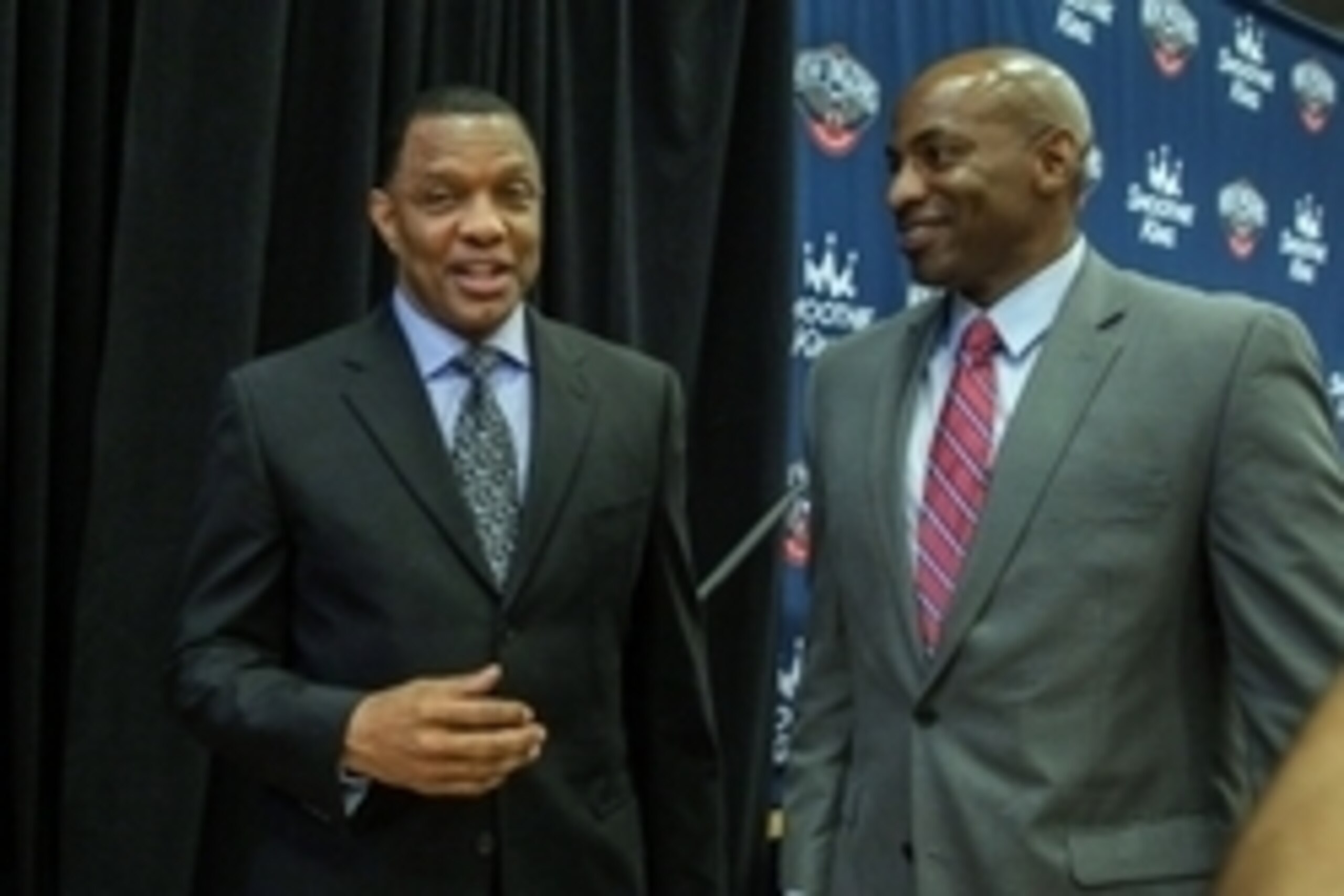 Jun 22, 2015; New Orleans, LA, USA; New Orleans Pelicans head coach Alvin Gentry walks off with general manager Dell Demps (right) during a press conference at the New Orleans Pelicans Training Facility. Mandatory Credit: Derick E. Hingle-USA TODAY Sports