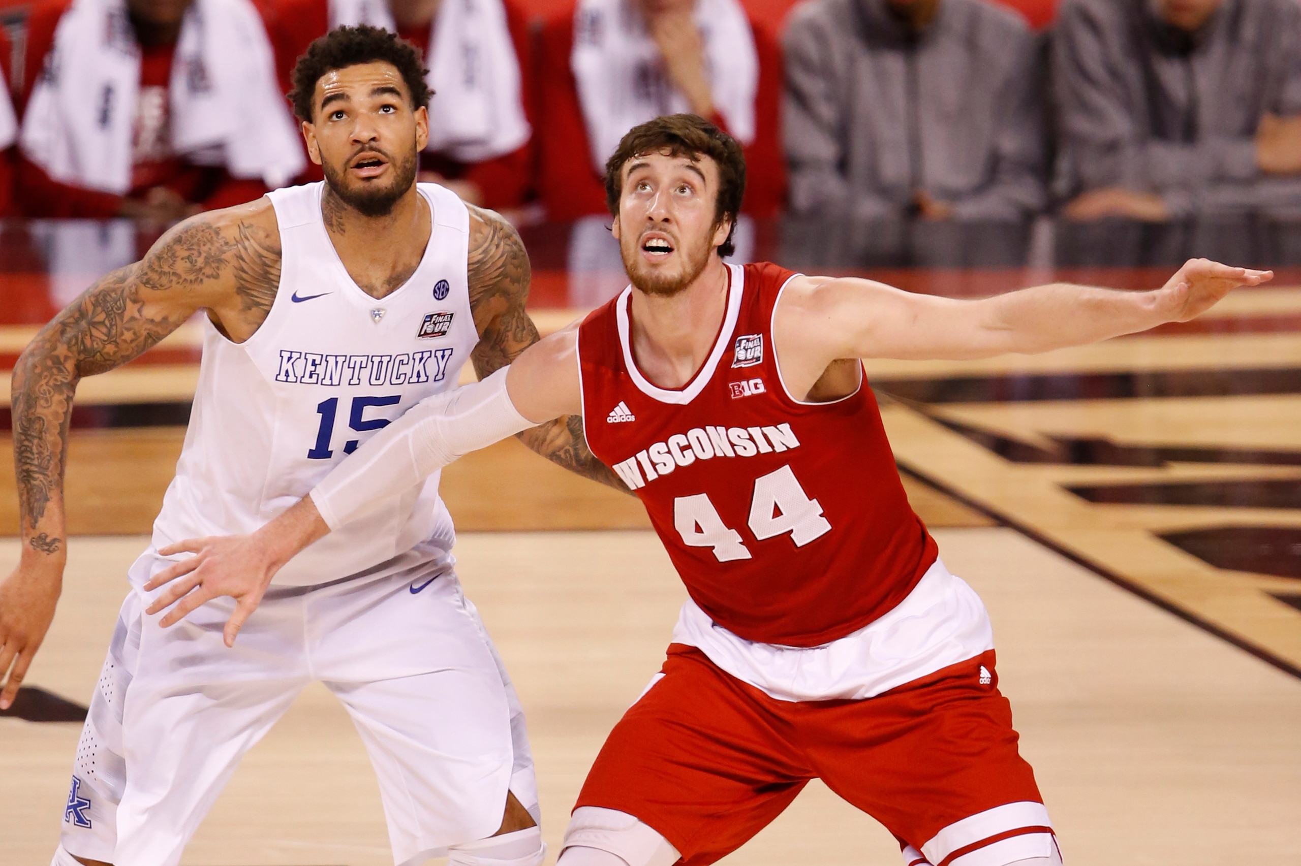 Apr 4, 2015; Indianapolis, IN, USA; Kentucky Wildcats forward Willie Cauley-Stein (15) and Wisconsin Badgers forward Frank Kaminsky (44) watch a shot during the second half of the 2015 NCAA Men's Division I Championship semi-final game at Lucas Oil Stadiu