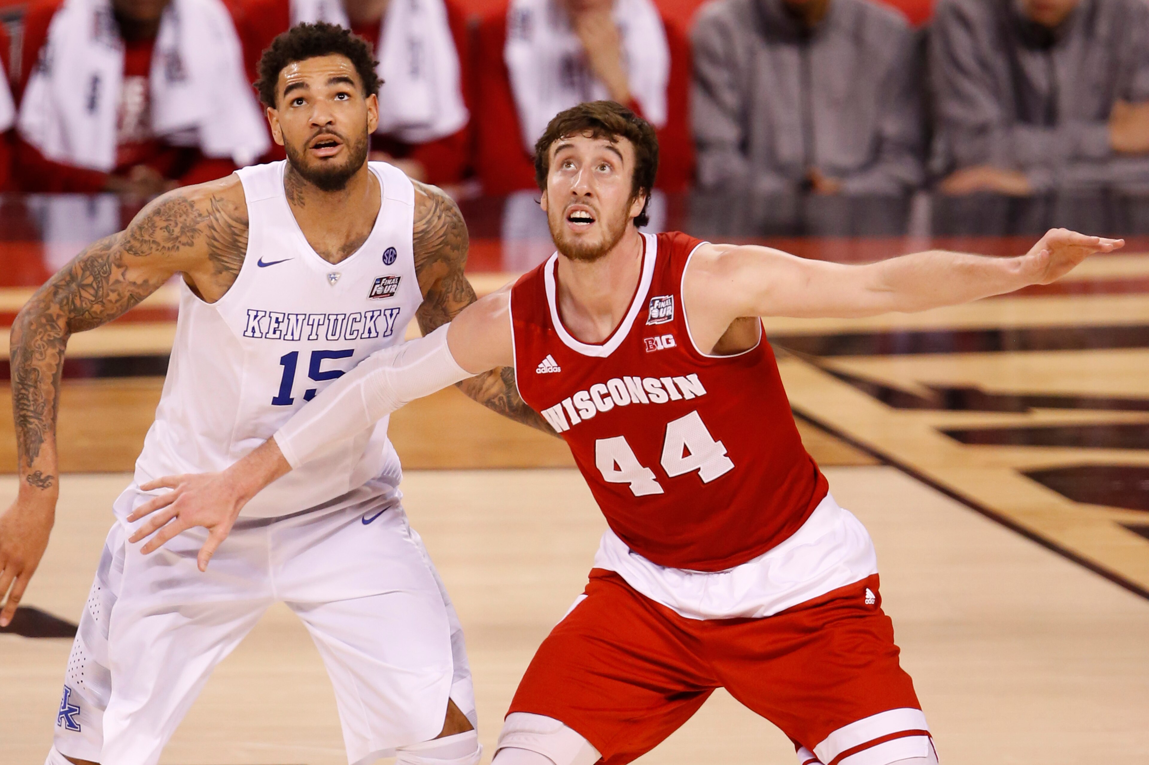 Apr 4, 2015; Indianapolis, IN, USA; Kentucky Wildcats forward Willie Cauley-Stein (15) and Wisconsin Badgers forward Frank Kaminsky (44) watch a shot during the second half of the 2015 NCAA Men's Division I Championship semi-final game at Lucas Oil Stadiu