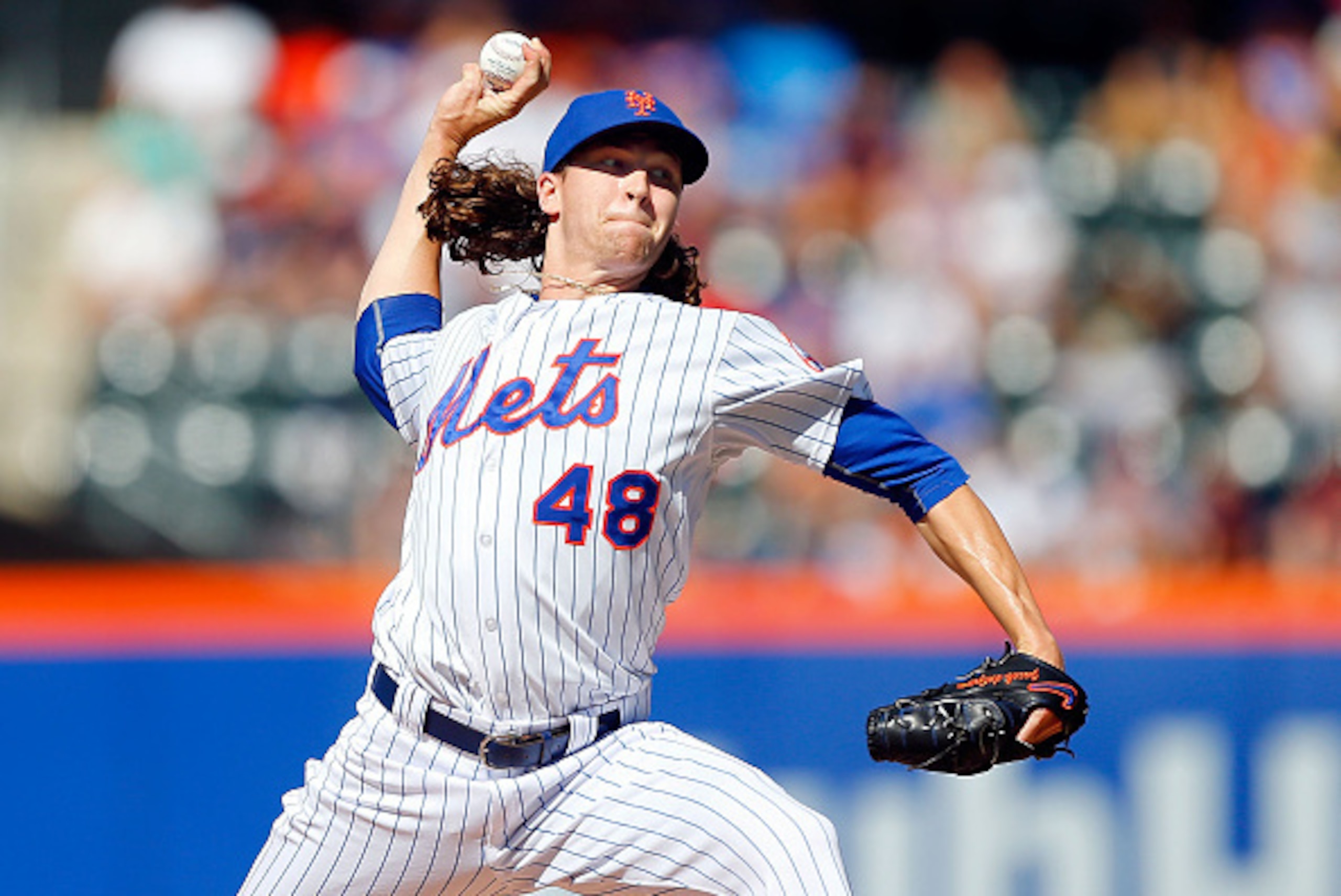 NEW YORK, NY - JUNE 13:  Jacob deGrom #48 of the New York Mets pitches in the first inning against the Atlanta Braves at Citi Field on June 13, 2015 in the Flushing neighborhood of the Queens borough of New York City.  (Photo by Jim McIsaac/Getty Images)
