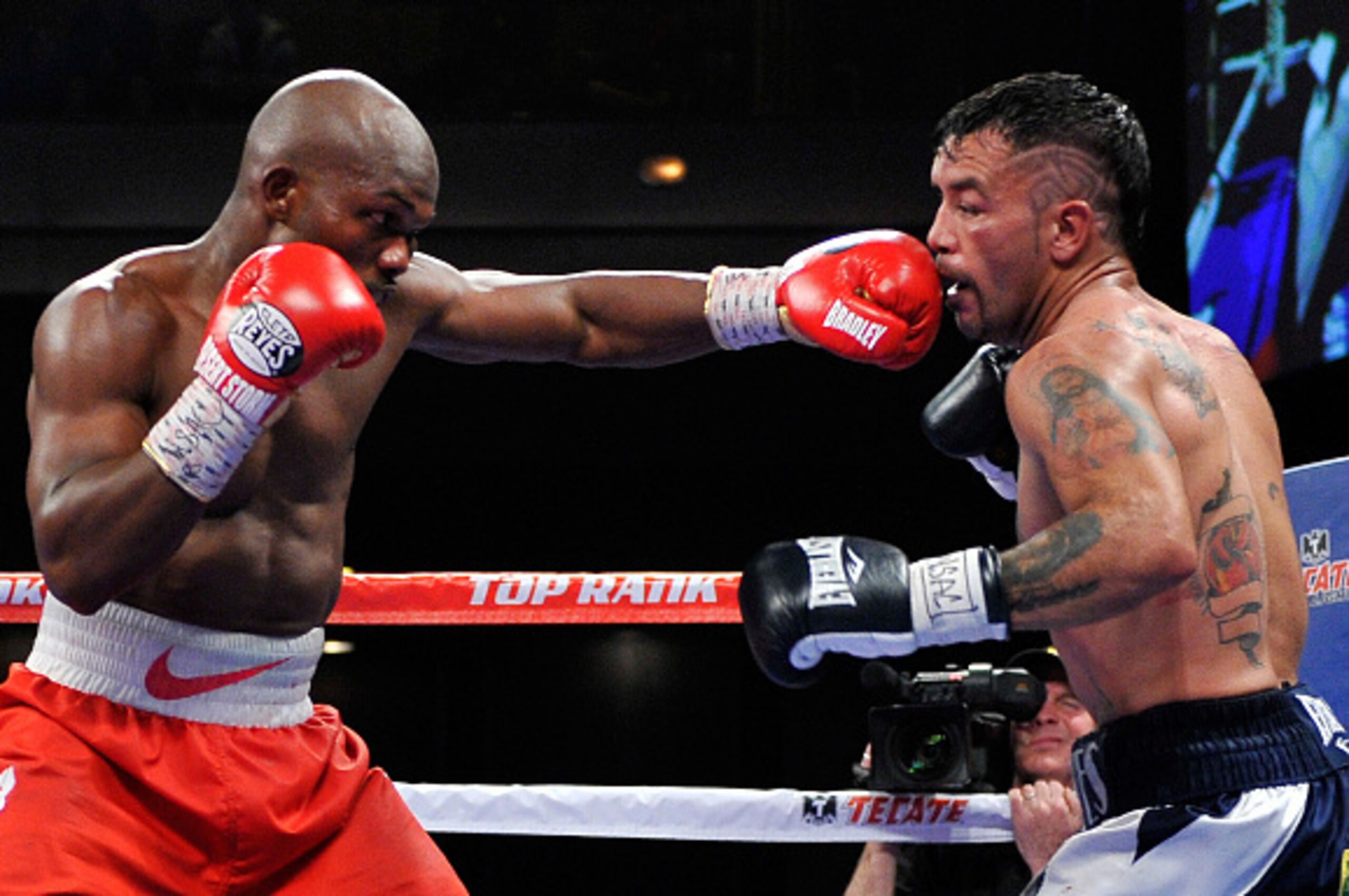 LAS VEGAS, NV - DECEMBER 13: Timothy Bradley Jr. (L) punches Diego Chaves during their welterweight bout at The Chelsea at The Cosmopolitan of Las Vegas on December 13, 2014 in Las Vegas, Nevada. The 12-round fight ended in a draw. (Photo by David Becke LAS VEGAS, NV - DECEMBER 13: Timothy Bradley Jr. (L) punches Diego Chaves during their welterweight bout at The Chelsea at The Cosmopolitan of Las Vegas on December 13, 2014 in Las Vegas, Nevada. The 12-round fight ended in a draw. (Photo by David Becke