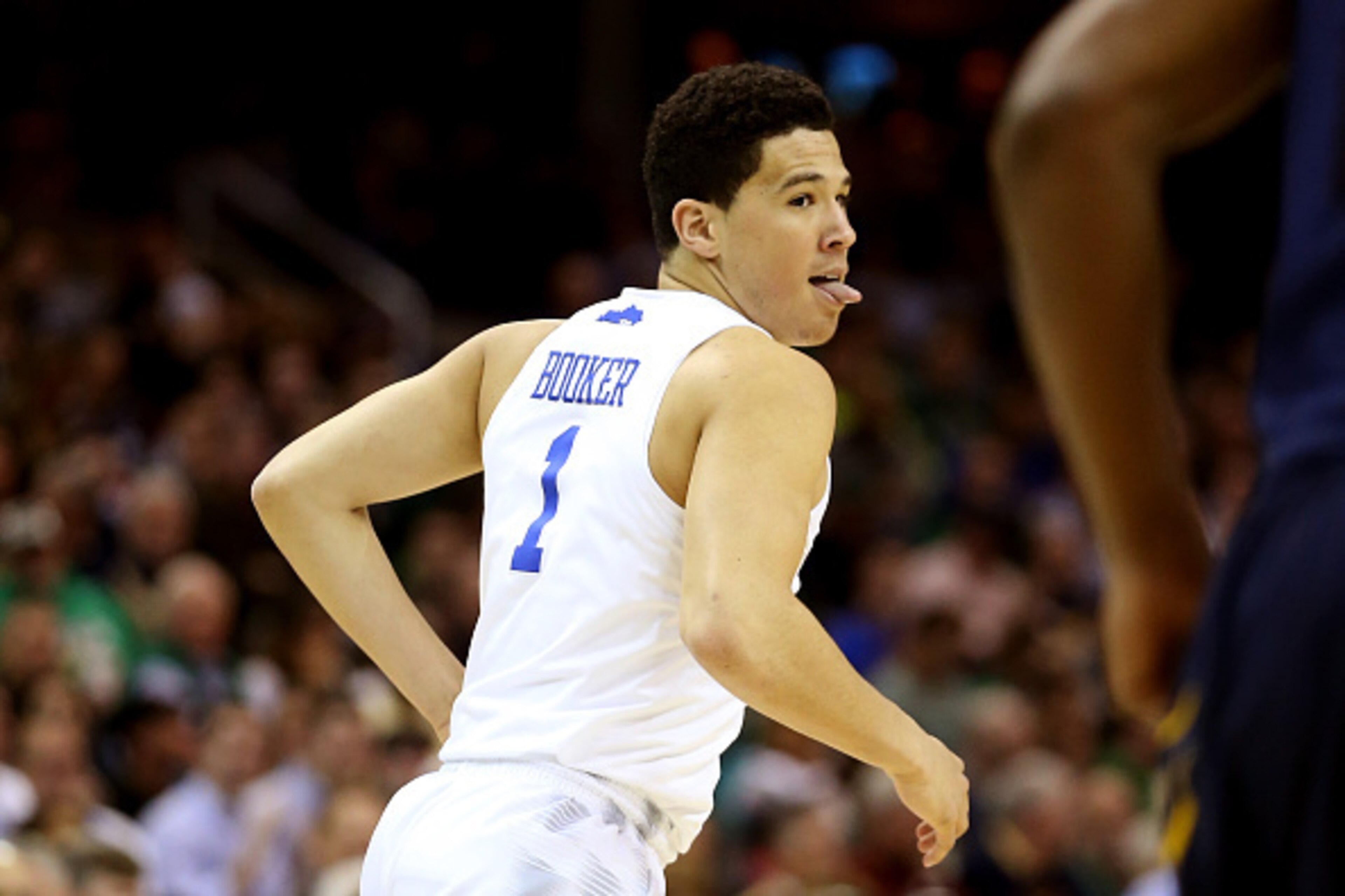 CLEVELAND, OH - MARCH 26: Devin Booker #1 of the Kentucky Wildcats reacts after making a three point basket in the first half against the West Virginia Mountaineers during the Midwest Regional semifinal of the 2015 NCAA Men's Basketball Tournament at Quic CLEVELAND, OH - MARCH 26: Devin Booker #1 of the Kentucky Wildcats reacts after making a three point basket in the first half against the West Virginia Mountaineers during the Midwest Regional semifinal of the 2015 NCAA Men's Basketball Tournament at Quic