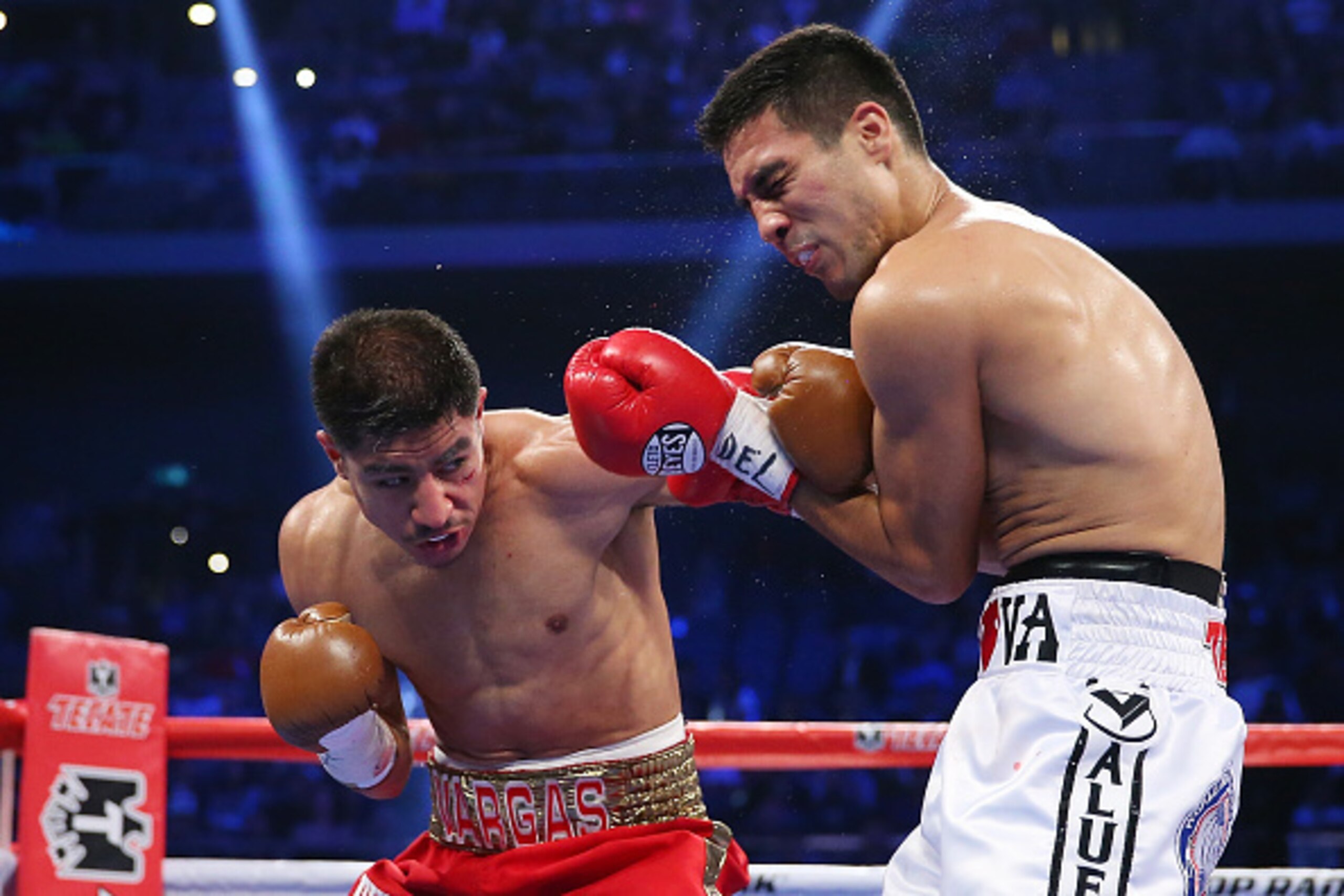 MACAU - NOVEMBER 23: Jessie Vargas of the United States punches Antonio DeMarco of Mexico during the WBA world super lightweight title fight at The Venetian on November 23, 2014 in Macau, Macau. (Photo by Chris Hyde/Getty Images) MACAU - NOVEMBER 23: Jessie Vargas of the United States punches Antonio DeMarco of Mexico during the WBA world super lightweight title fight at The Venetian on November 23, 2014 in Macau, Macau. (Photo by Chris Hyde/Getty Images)
