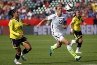 Jun 22, 2015; Edmonton, Alberta, CAN; United States forward Abby Wambach (20) runs down a  ball in the box against Colombia defender Angela Clavijo (13) during the first half in the round of sixteen in the FIFA 2015 women's World Cup soccer tournament at 