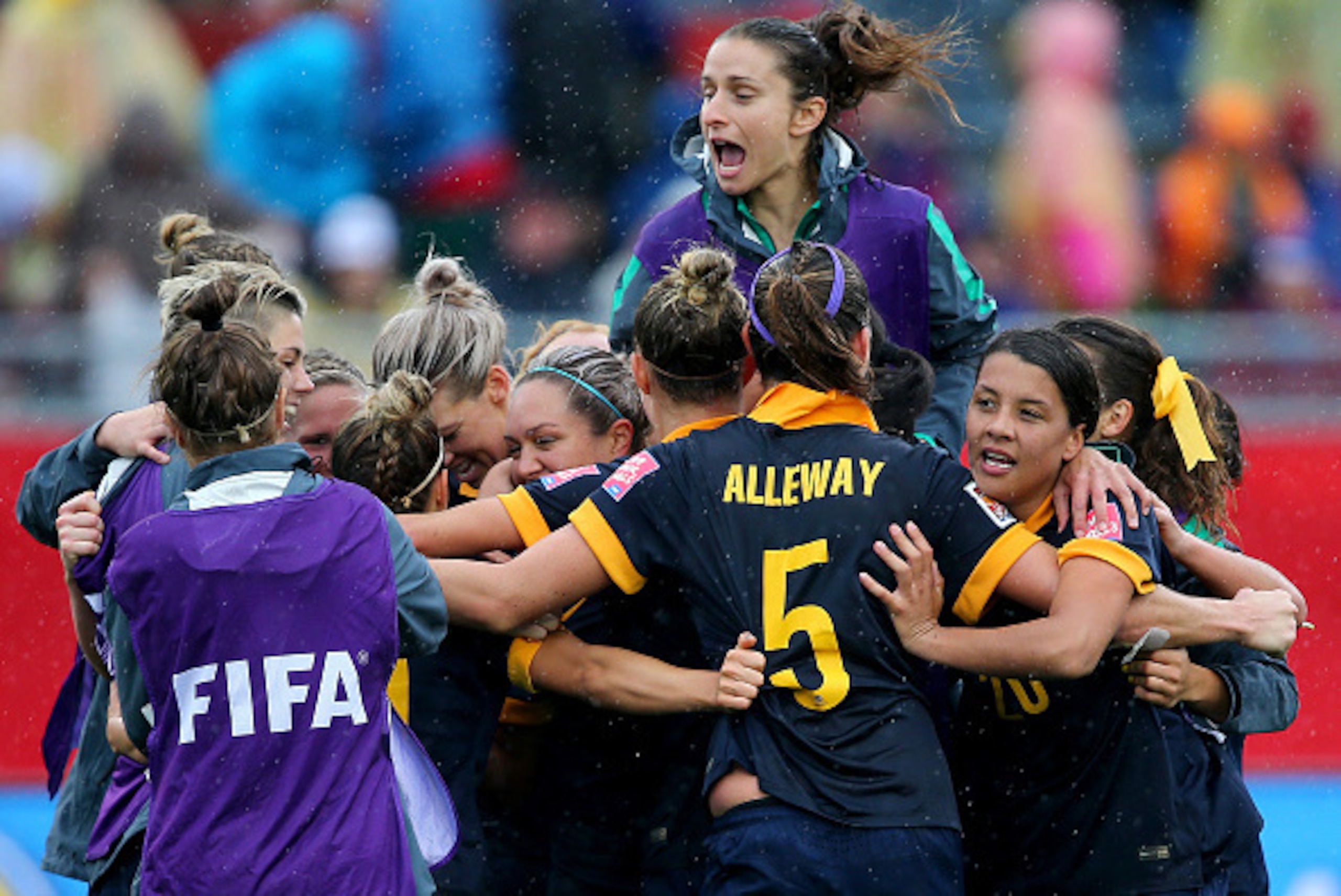 MONCTON, NB - JUNE 21:  Australia celebrate the 1-0 win over Brazil during the FIFA Women's World Cup 2015 round of 16 match between Brazil and Australia at Moncton Stadium on June 21, 2015 in Moncton, Canada.  (Photo by Elsa/Getty Images)