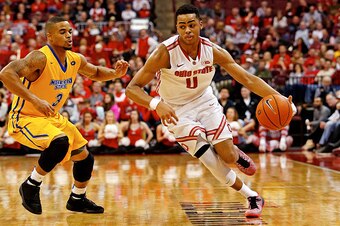 COLUMBUS, OH - DECEMBER 13:  D'Angelo Russell #0 of the Ohio State Buckeyes drives the ball past Corban Collins #3 of the Morehead State Eagles during the second half at Value City Arena on December 13, 2014 in Columbus, Ohio. Ohio State defeated Morhead 