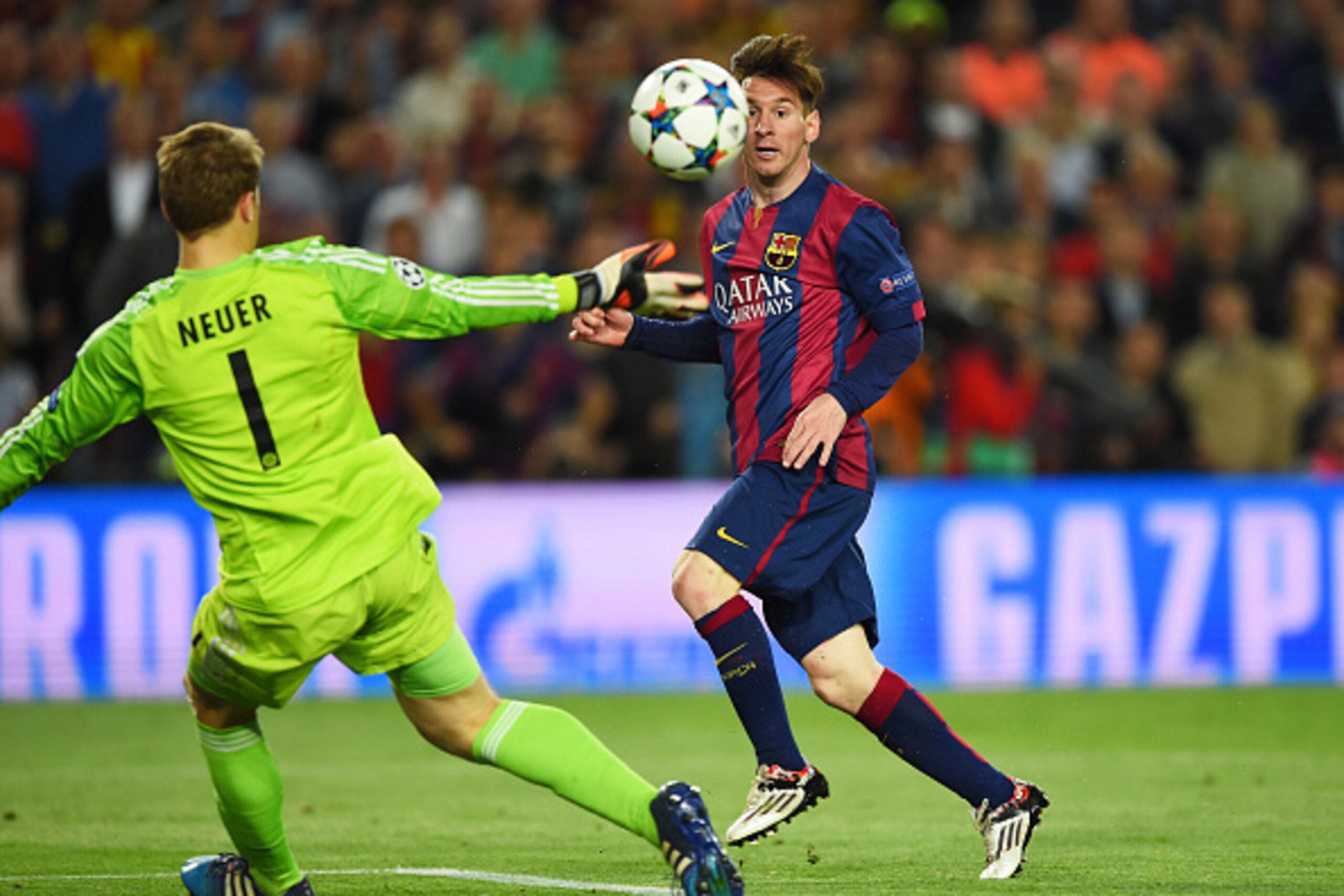 BARCELONA, SPAIN - MAY 06: Lionel Messi of Barcelona chips the ball over goalkeeper Manuel Neuer of Bayern Muenchen to score his team's second goal during the UEFA Champions League Semi Final, first leg match between FC Barcelona and FC Bayern Muenchen a BARCELONA, SPAIN - MAY 06: Lionel Messi of Barcelona chips the ball over goalkeeper Manuel Neuer of Bayern Muenchen to score his team's second goal during the UEFA Champions League Semi Final, first leg match between FC Barcelona and FC Bayern Muenchen a
