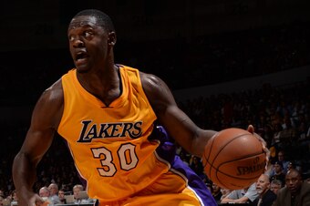 SAN DIEGO, CA- OCTOBER 6: Julius Randle #30 of the Los Angeles drives to the hoop against the Denver Nuggets as the Los Angeles Lakers take on the Denver Nuggets at the Valley View Sports Arena in San Diego, California on October 6, 2014 . NOTE TO USER: U